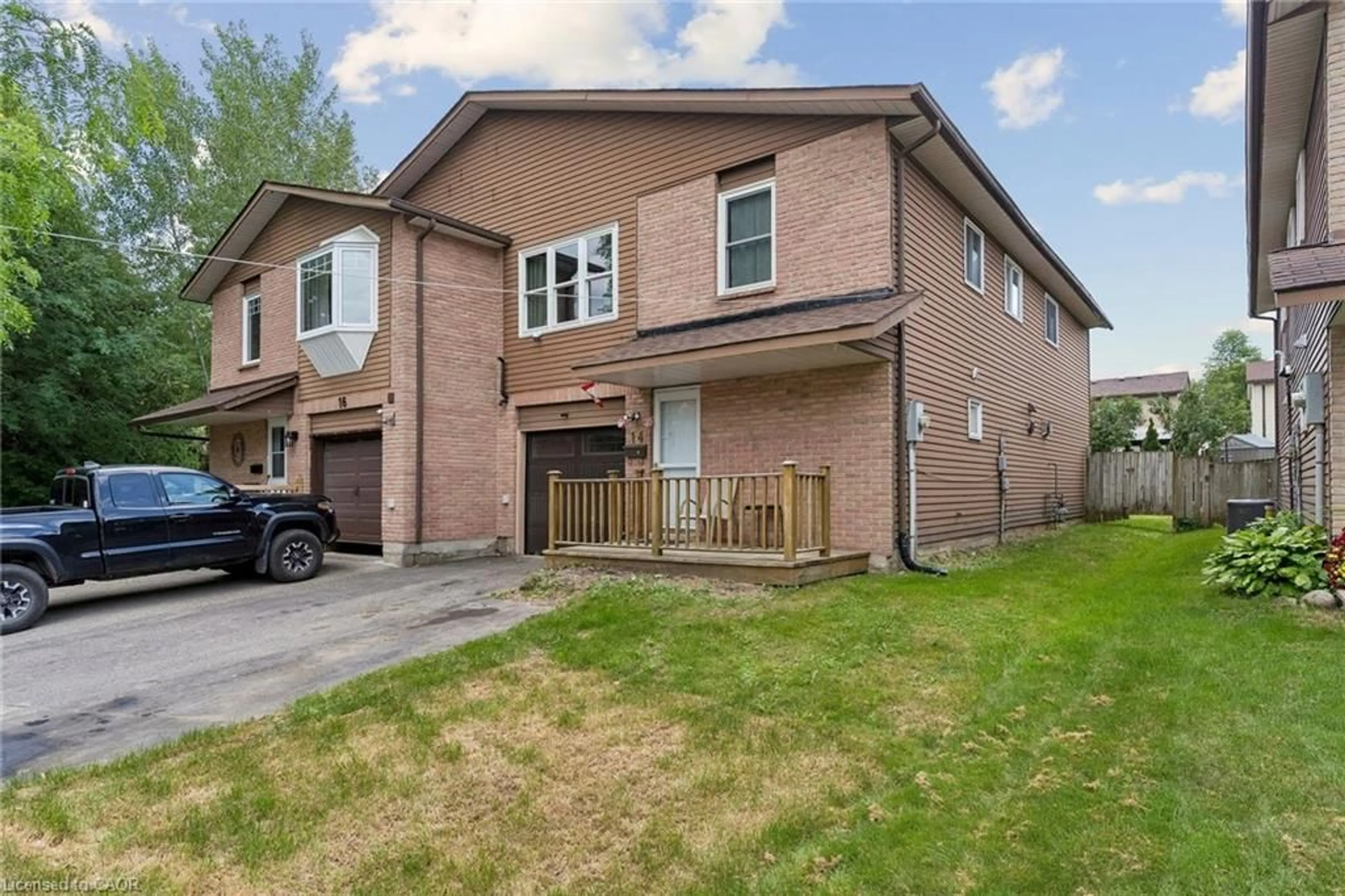 Home with brick exterior material, street for 14 Steven St, Orangeville Ontario L9W 4G1
