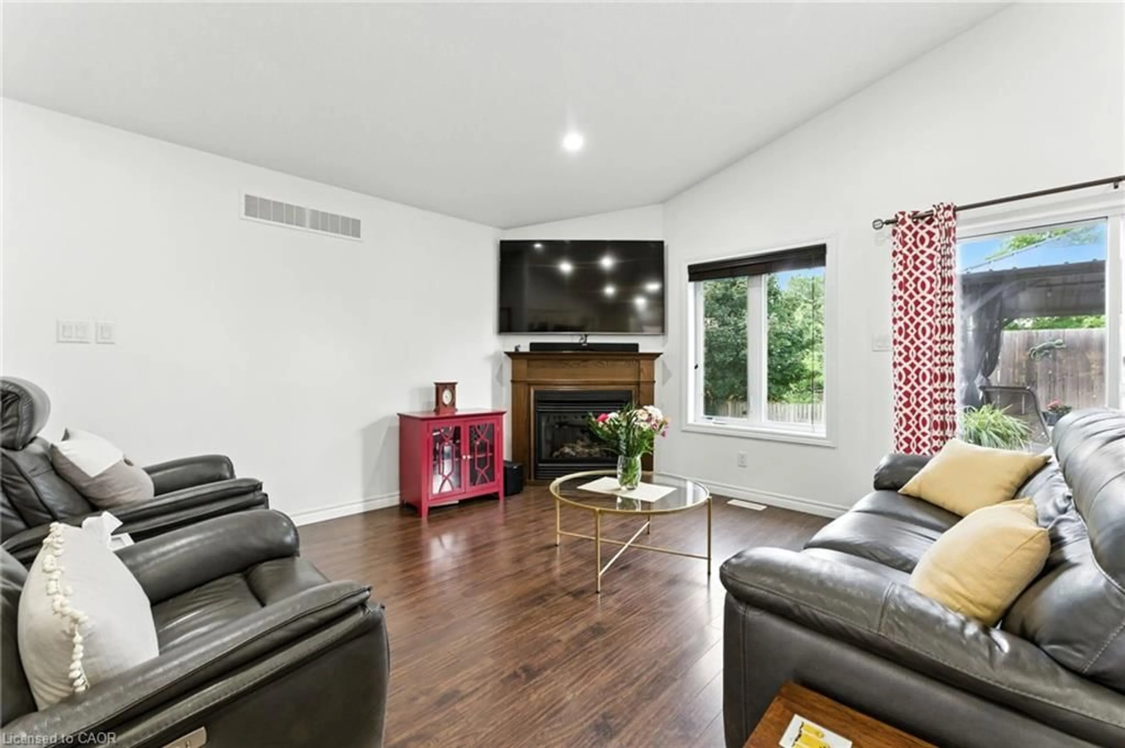 Living room with furniture, wood/laminate floor for 107 Applewood St, Plattsville Ontario N0J 1S0