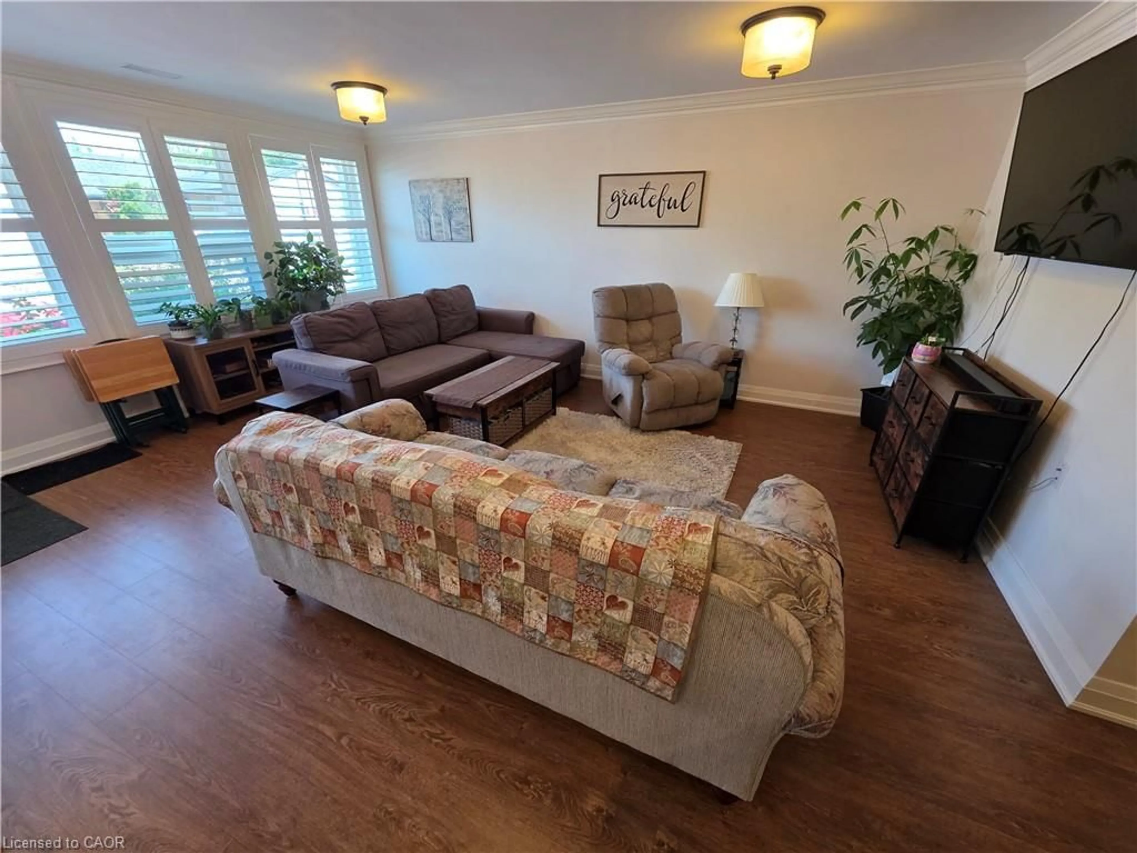 Living room with furniture, unknown for 58 Szollosy Cir, Hamilton Ontario L9B 1T8