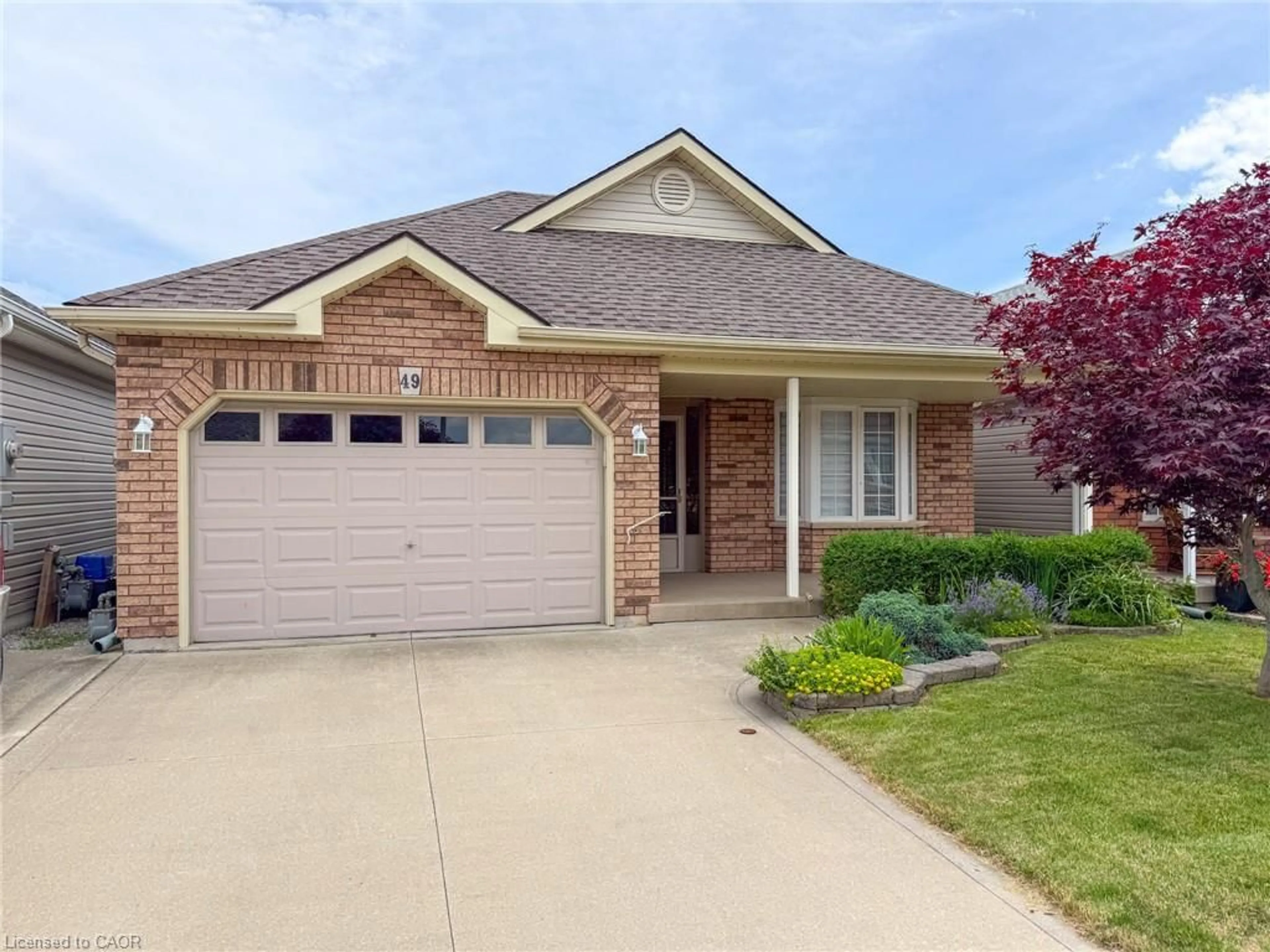 Home with brick exterior material, street for 49 Carolina Way, Port Rowan Ontario N0E 1M0