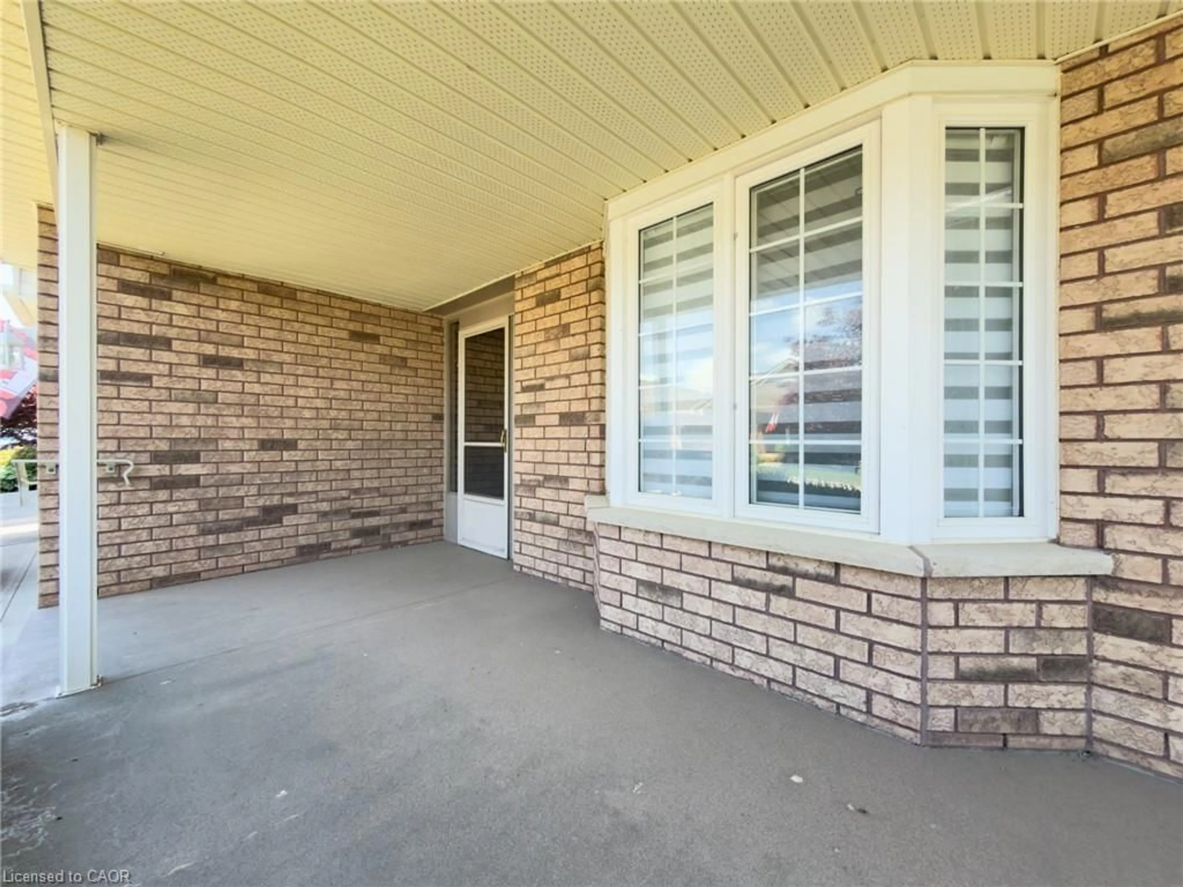 Home with brick exterior material, street for 49 Carolina Way, Port Rowan Ontario N0E 1M0