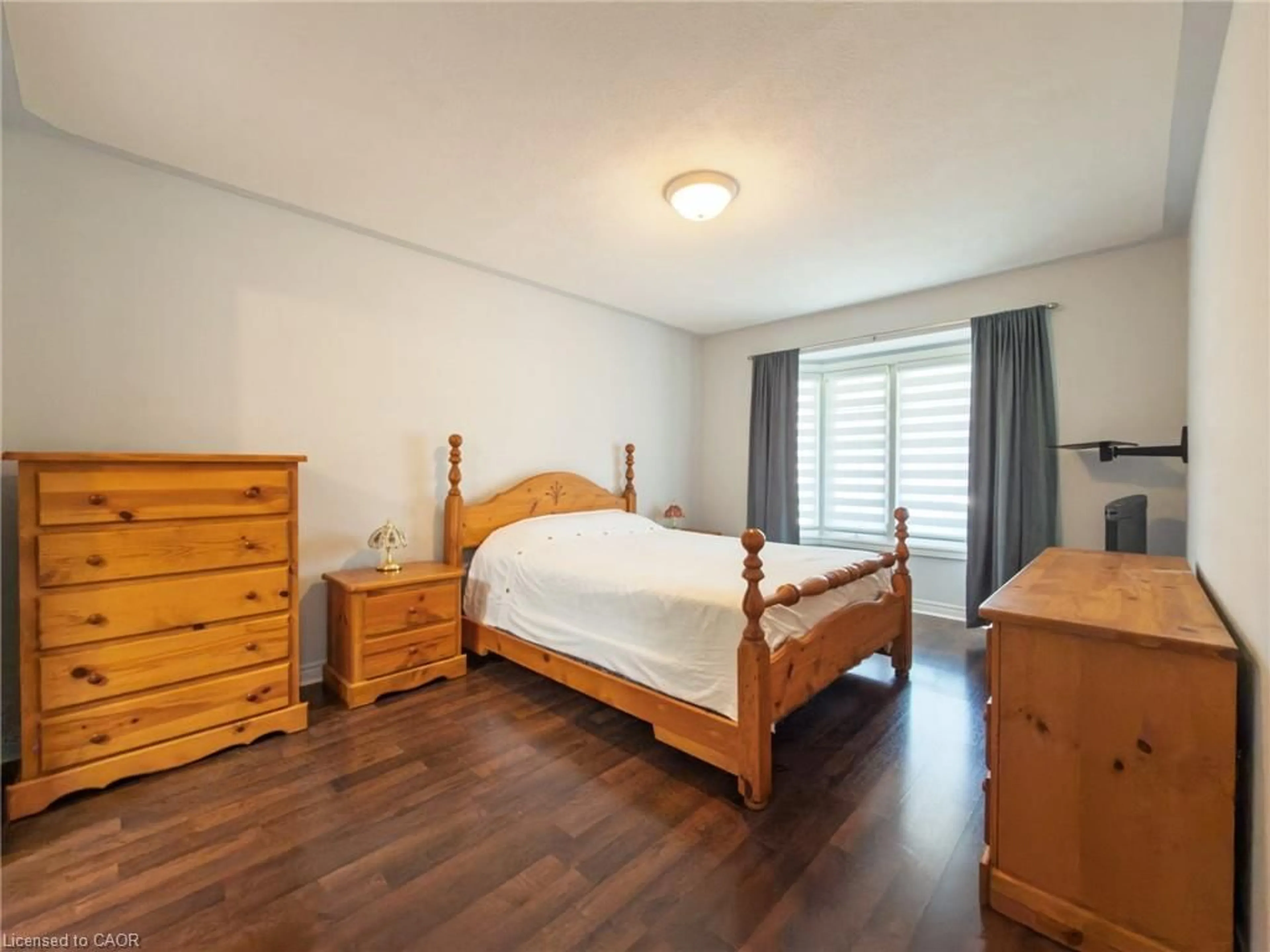 Bedroom with bed, wood/laminate floor for 49 Carolina Way, Port Rowan Ontario N0E 1M0