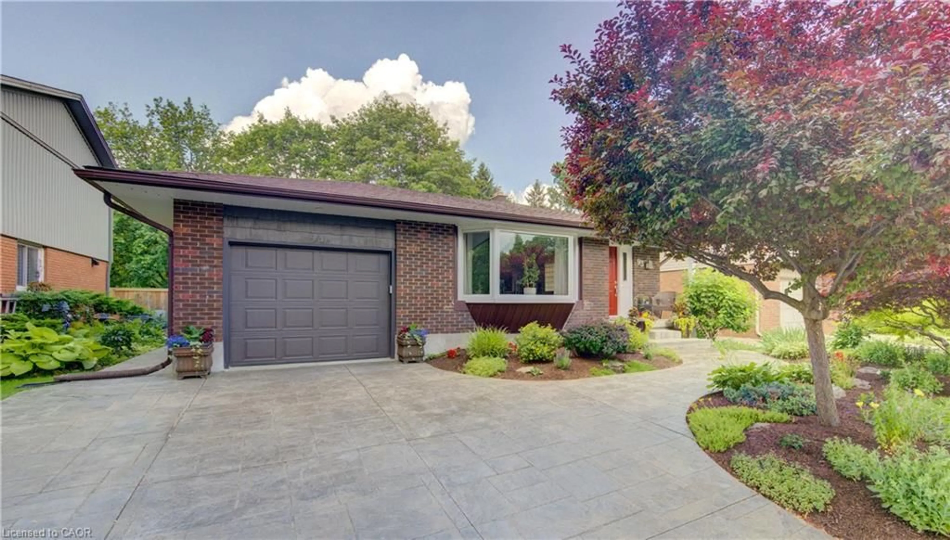 Home with brick exterior material, street for 93 Briargate Dr, Kitchener Ontario N2E 2J4