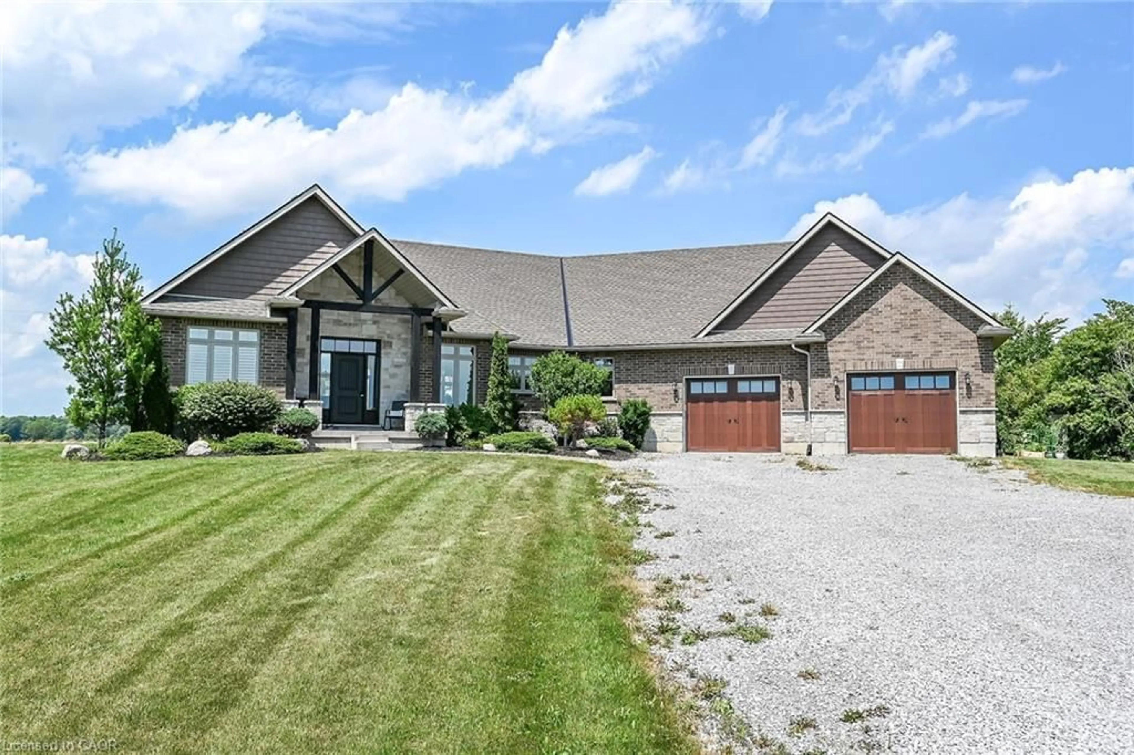 Home with brick exterior material, street for 1471 Concession 5 Woodhouse Rd, Port Dover Ontario N0A 1N1