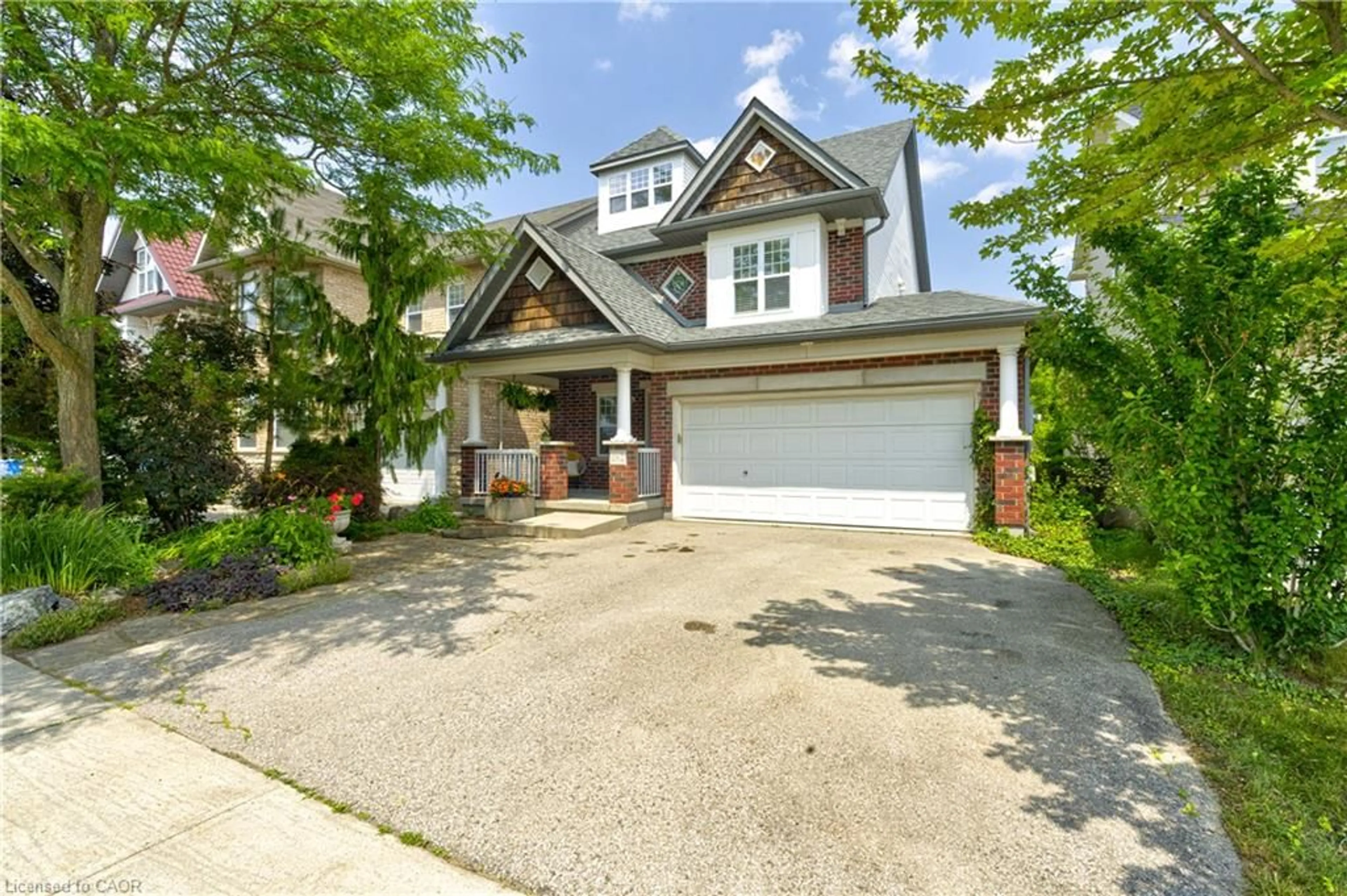 Home with brick exterior material, street for 282 Carrington Dr, Guelph Ontario N1G 5H2