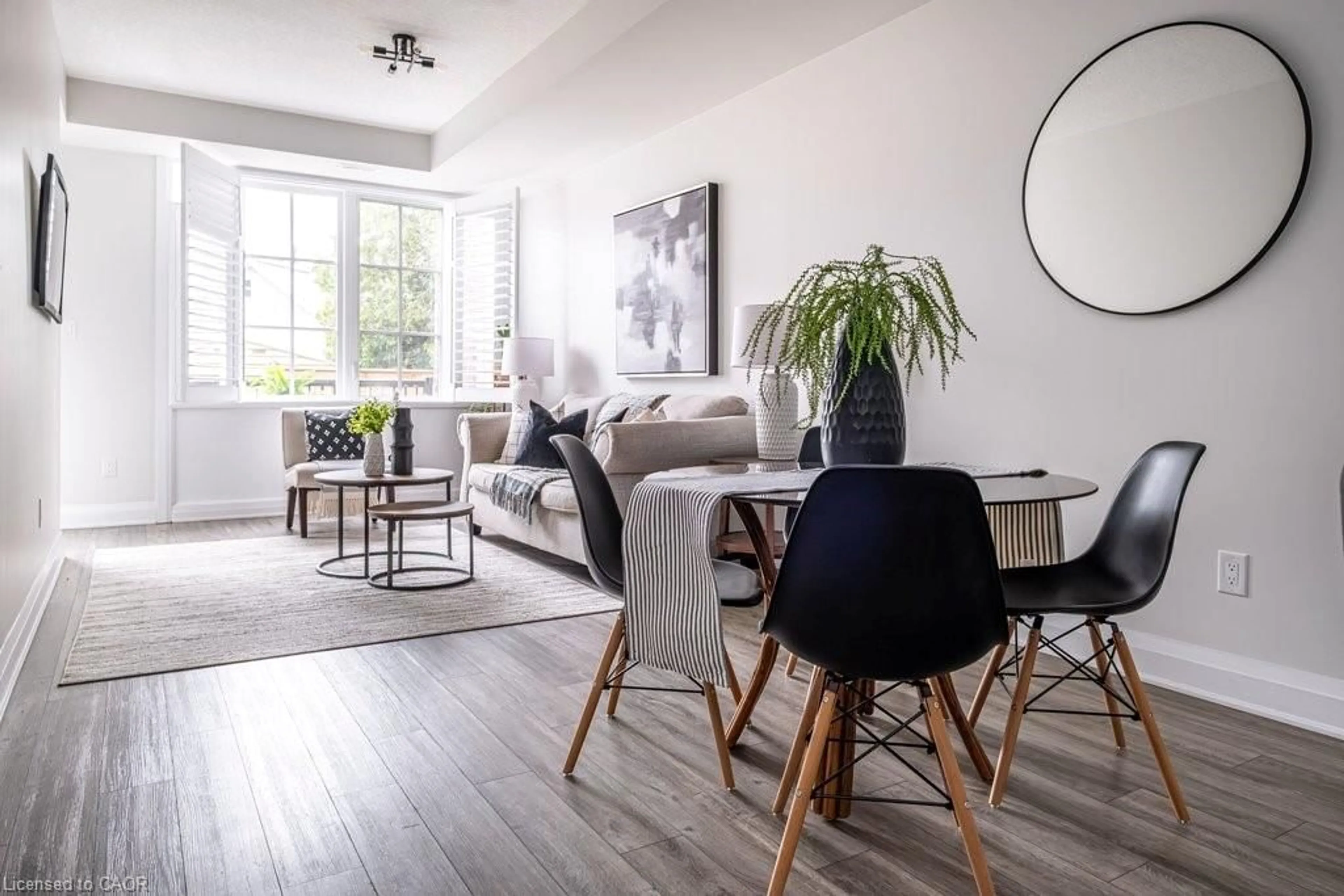 Living room with furniture, wood/laminate floor for 12 Blanshard St #202, Hamilton Ontario L8P 0C7
