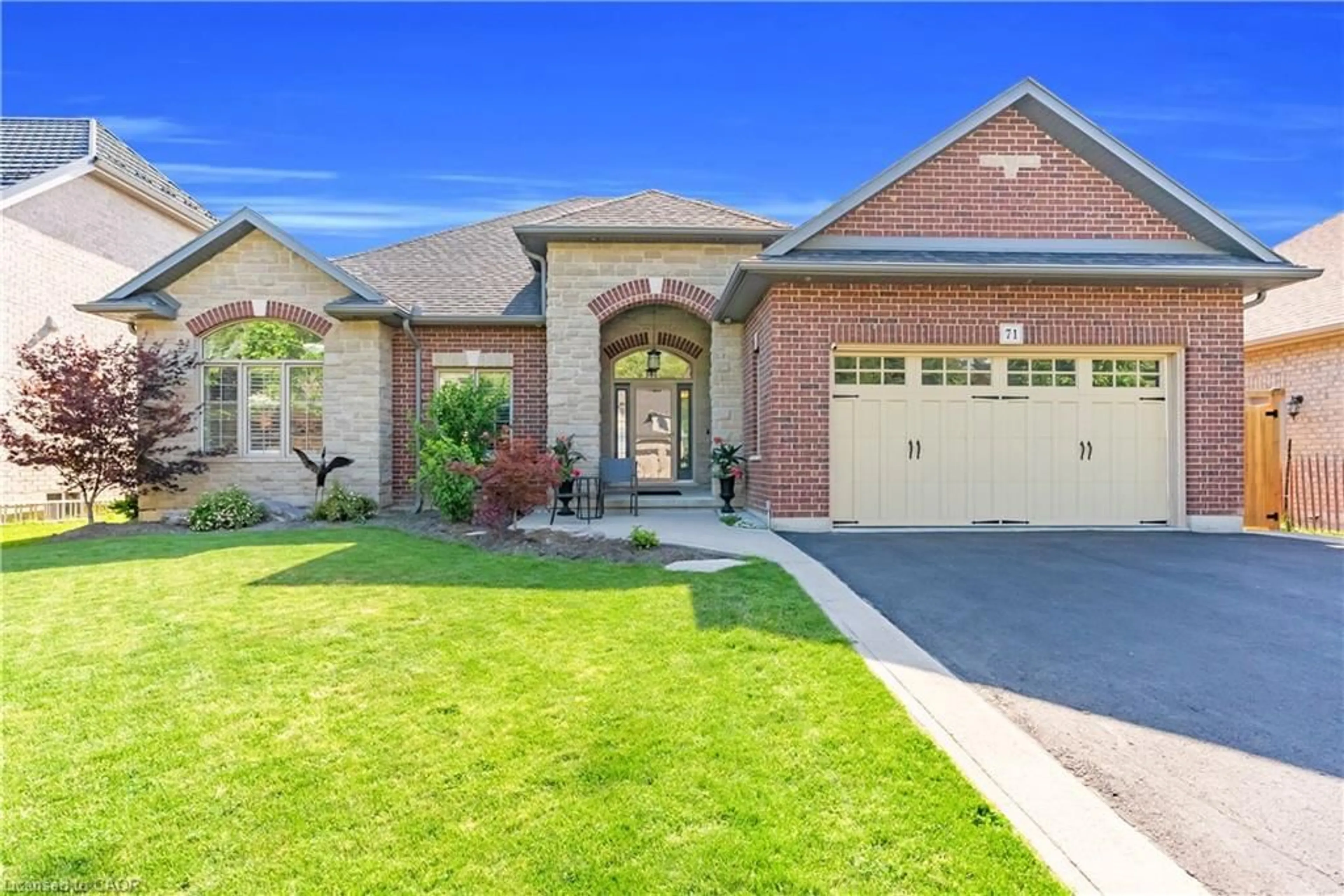 Home with brick exterior material, street for 71 Newport Lane, Port Dover Ontario N0A 1N7