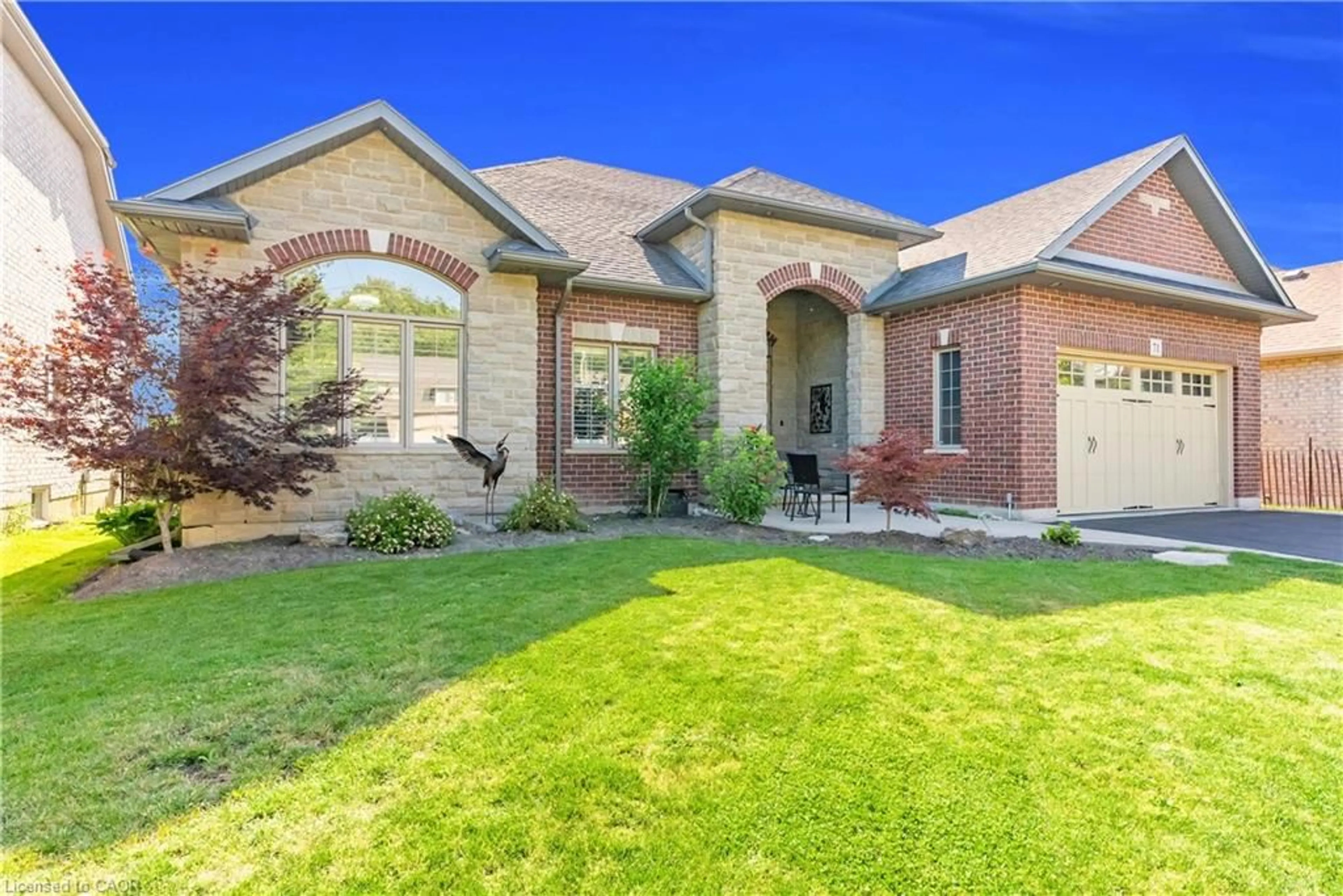 Home with brick exterior material, street for 71 Newport Lane, Port Dover Ontario N0A 1N7