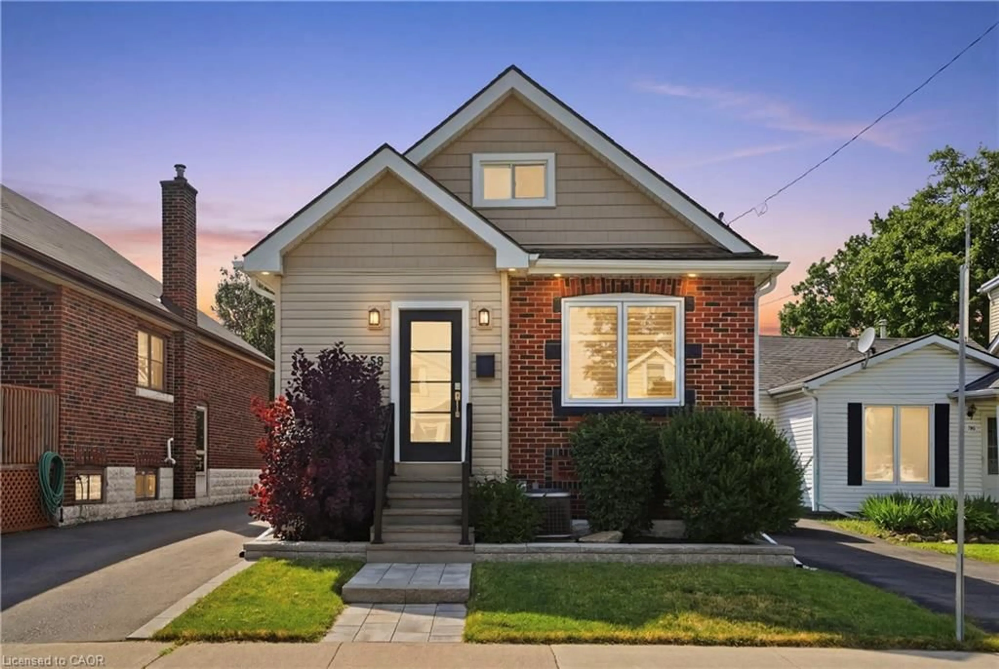 Home with brick exterior material, street for 58 Tragina Ave, Hamilton Ontario L8K 2Z3