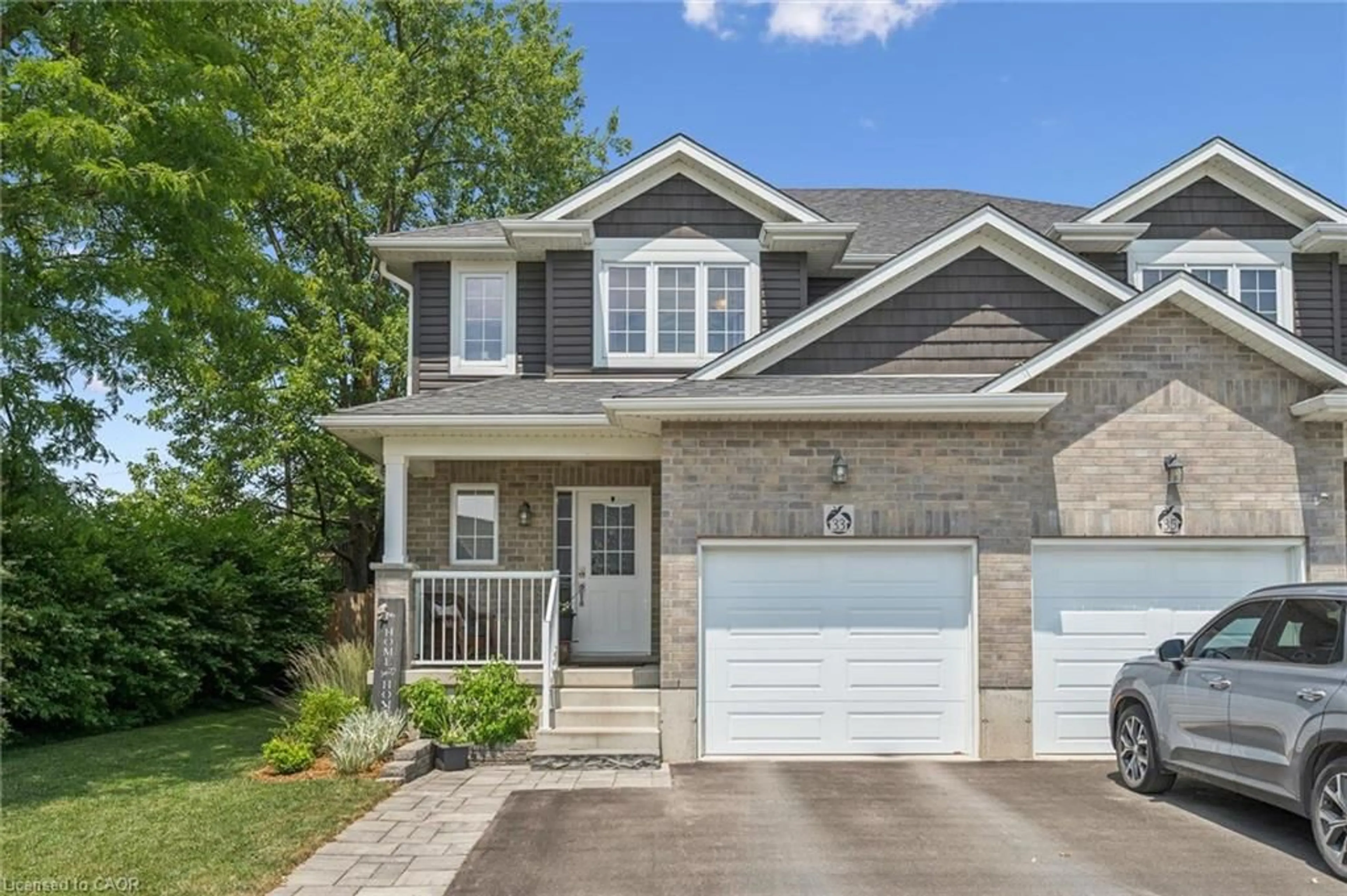 Home with brick exterior material, street for 33 Roth St, Tavistock Ontario N0B 2R0