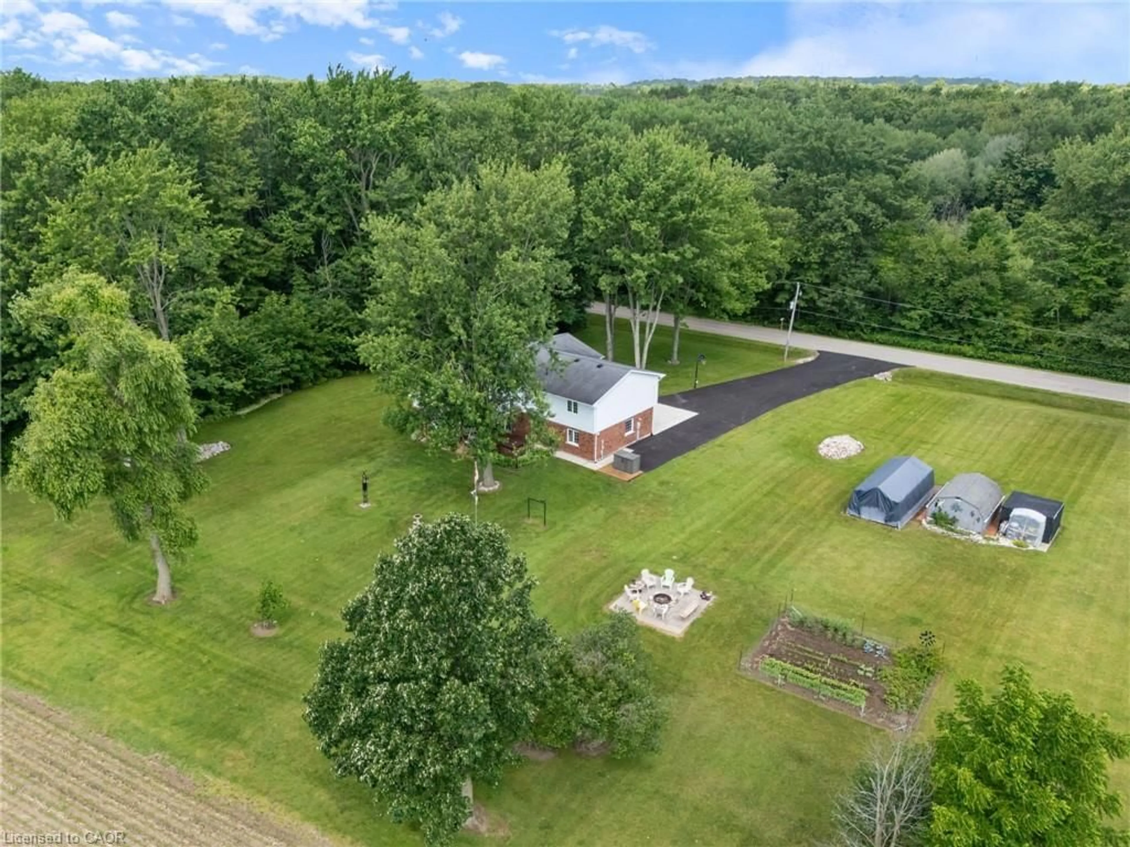 A pic from outside/outdoor area/front of a property/back of a property/a pic from drone, water/lake/river/ocean view for 204642 Ninth Rd, Tillsonburg Ontario N4G 4G8