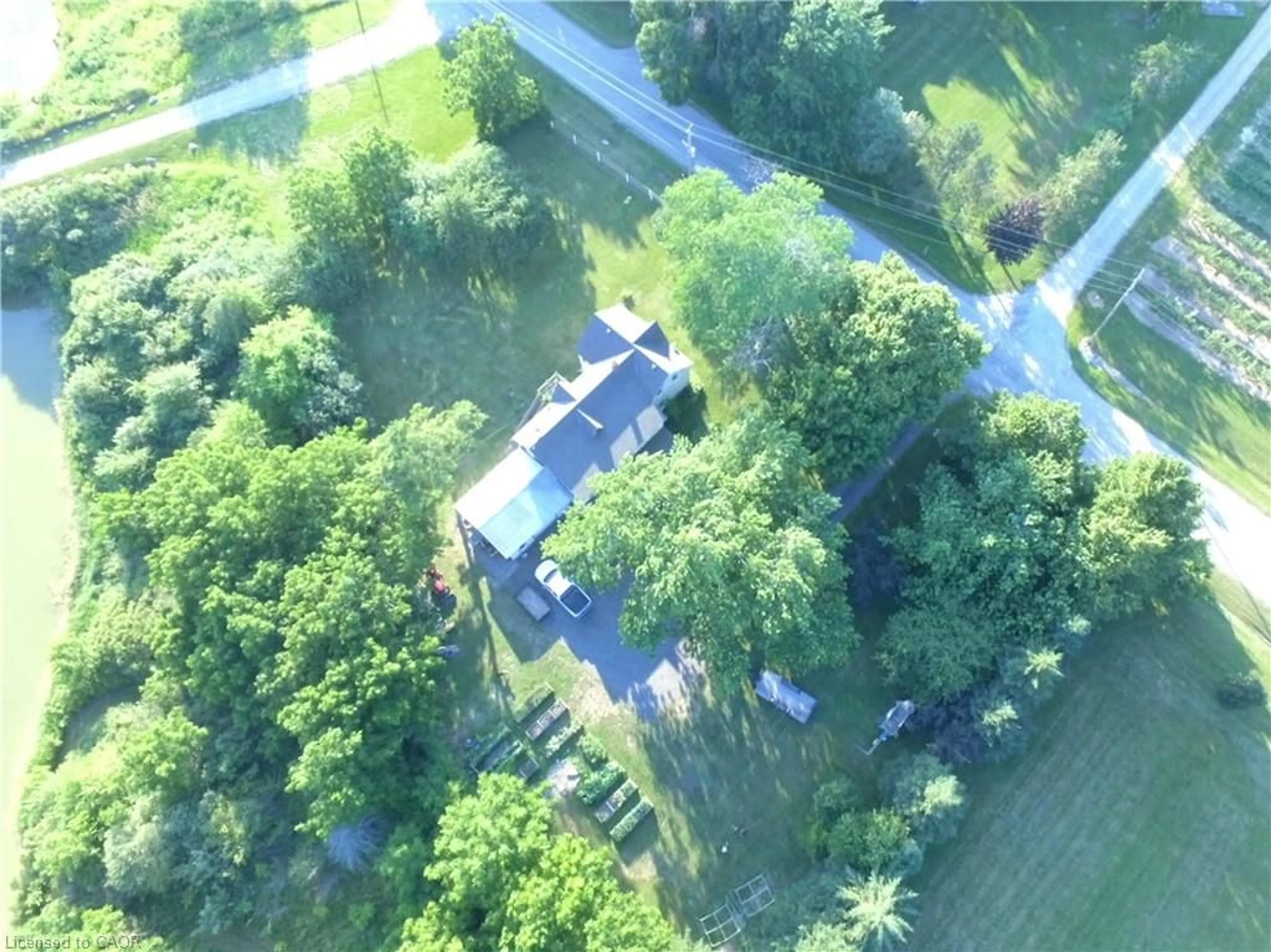 A pic from outside/outdoor area/front of a property/back of a property/a pic from drone, unknown for 874 Concession 14 Townsend, Simcoe Ontario N3Y 4K3