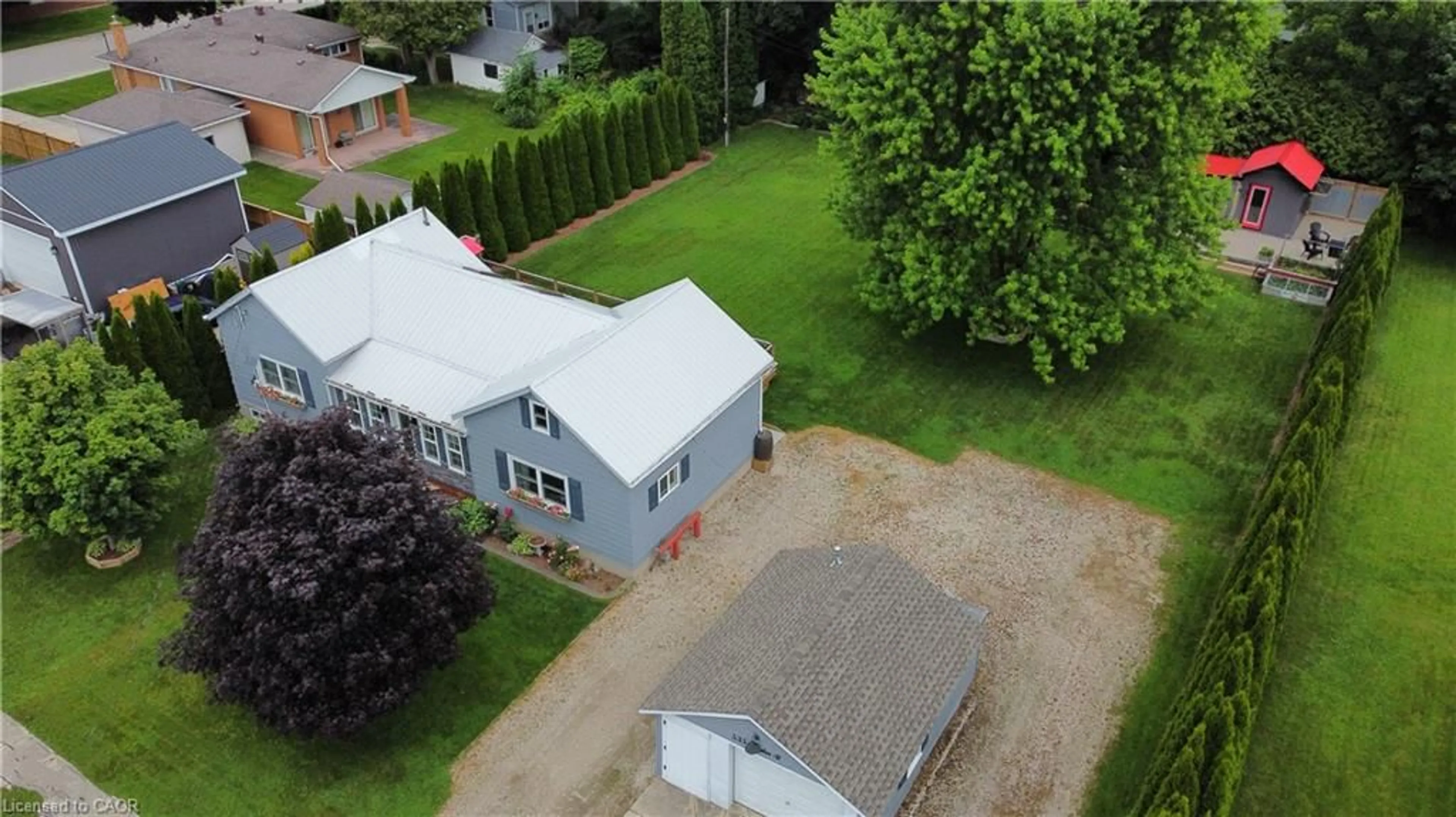 A pic from outside/outdoor area/front of a property/back of a property/a pic from drone, building for 535 Raglan St, Wellington Ontario N0G 2P0