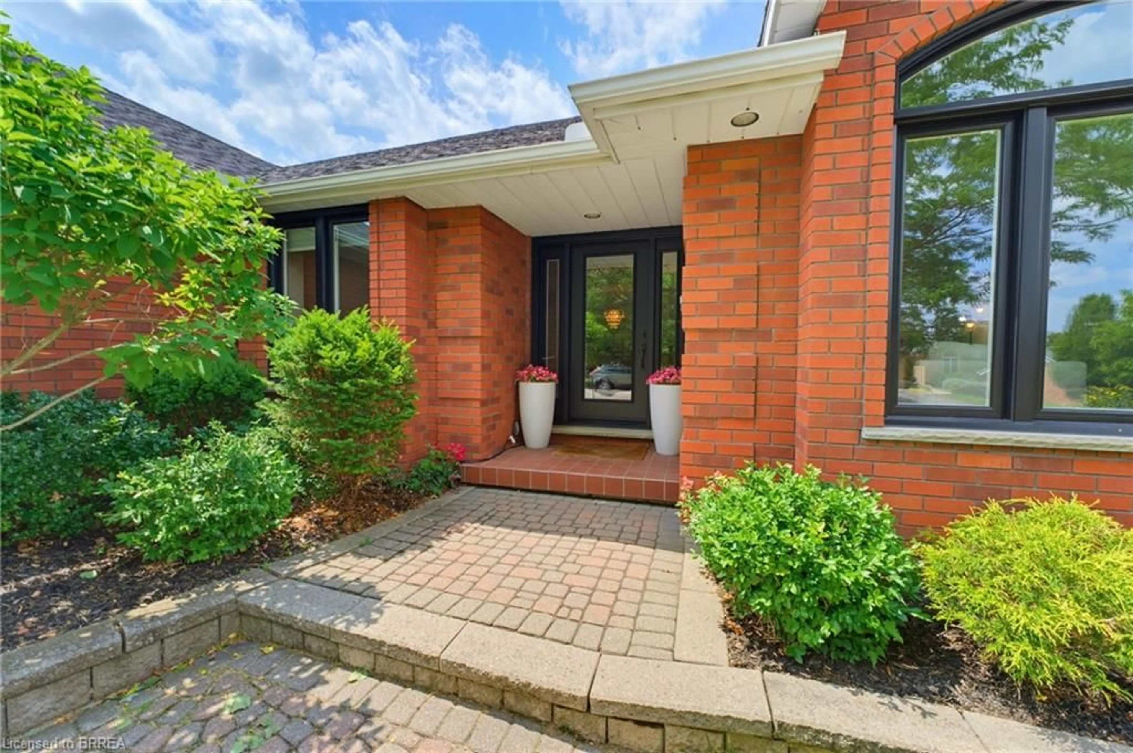 Home with brick exterior material, street for 12 Macbride Crt, Brantford Ontario N3T 6J1