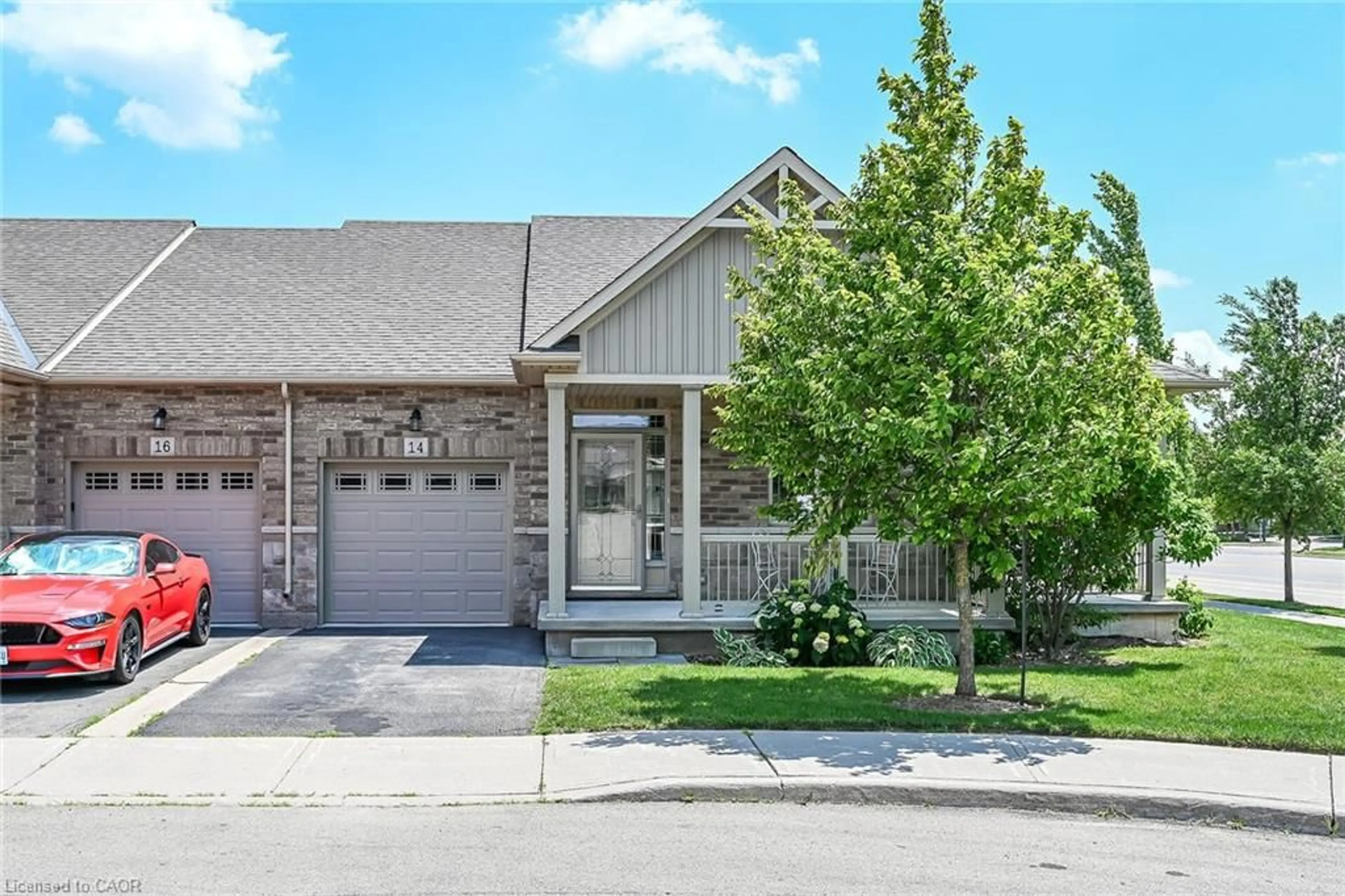 Home with brick exterior material, street for 14 Ecker Lane, Binbrook Ontario L0R 1C0