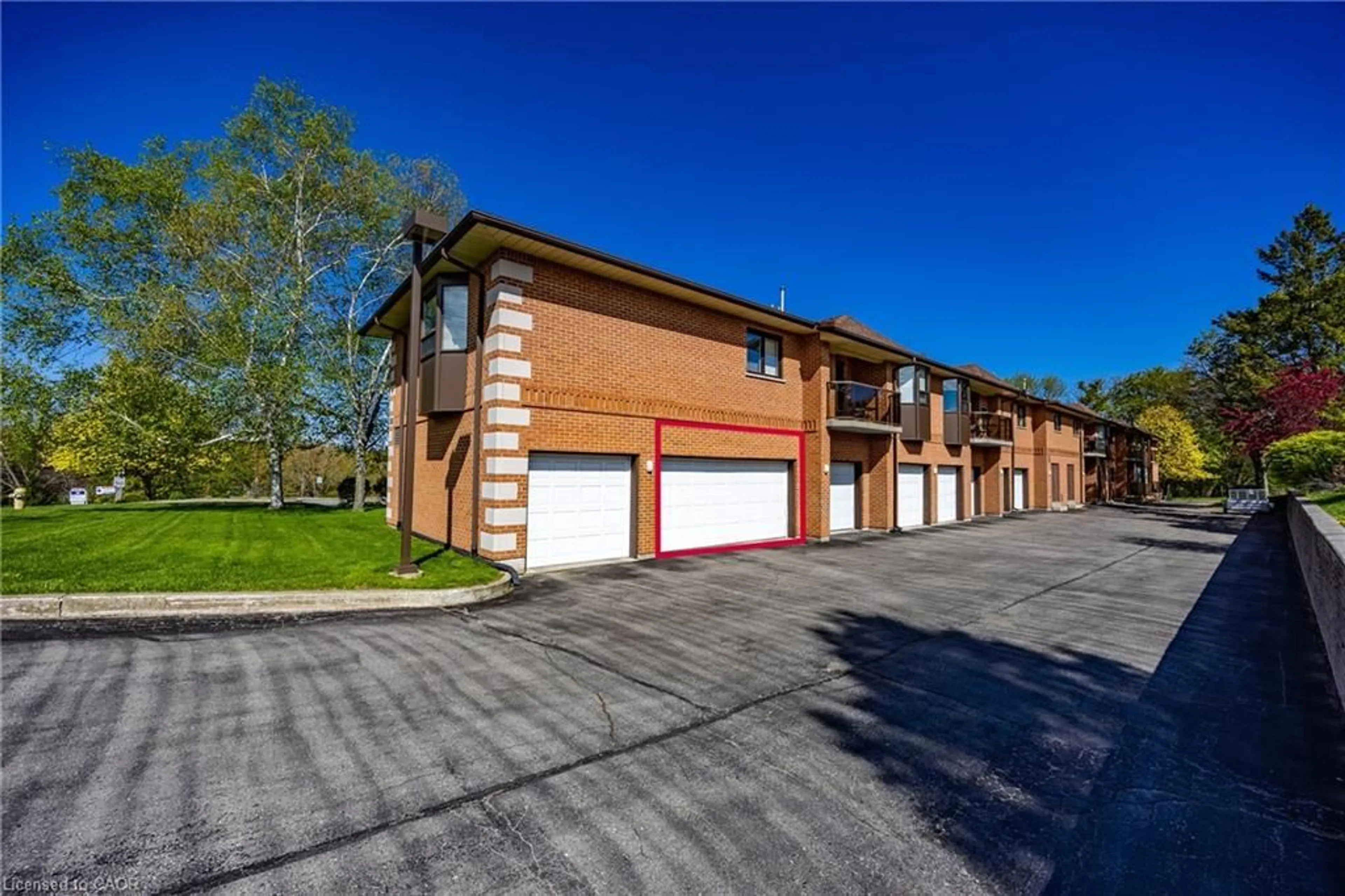 A pic from outside/outdoor area/front of a property/back of a property/a pic from drone, street for 303 William St #103, Delhi Ontario N4B 1N1