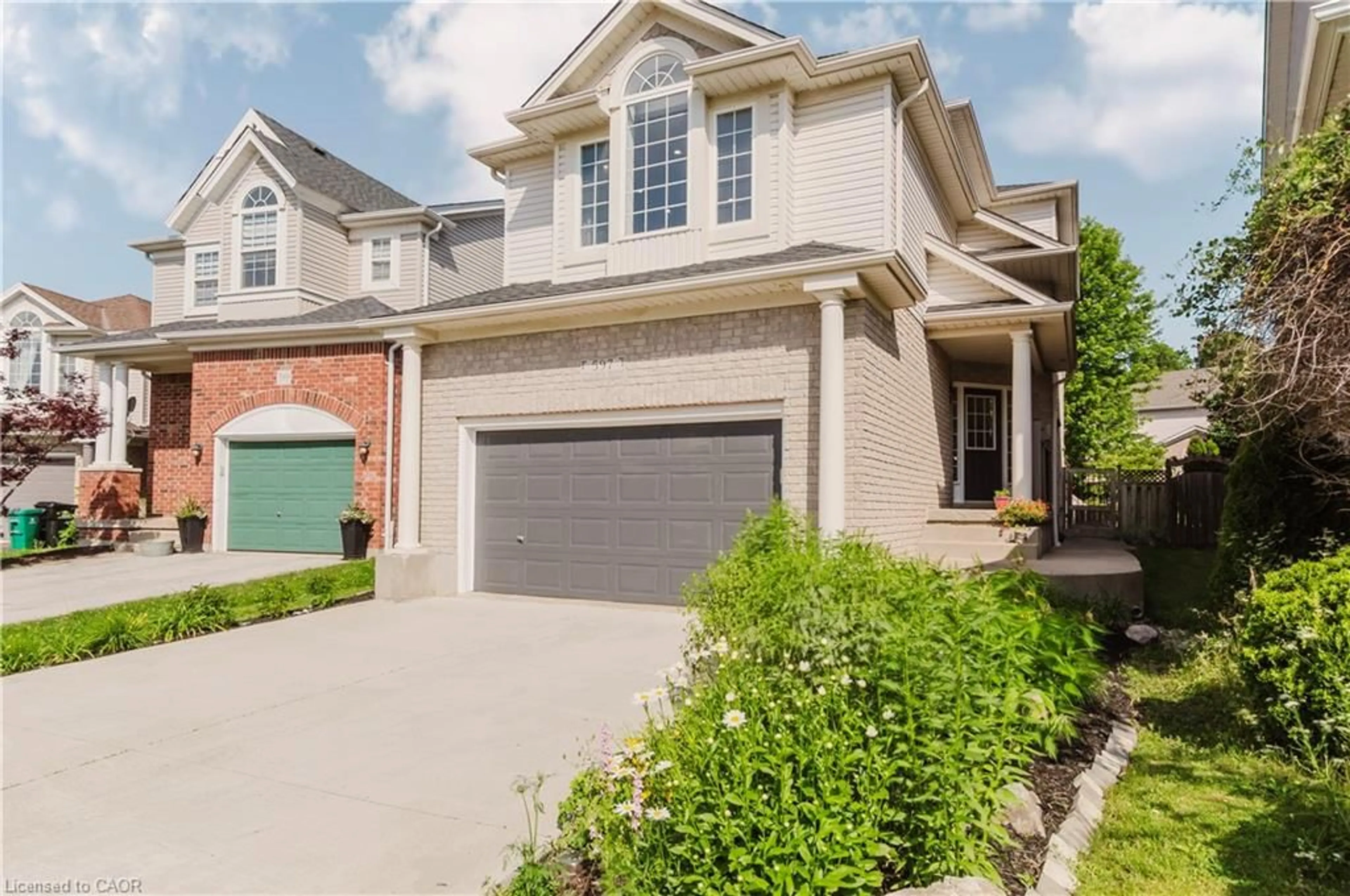 Home with brick exterior material, street for 597 Little Dover Cres, Waterloo Ontario N2K 4E5