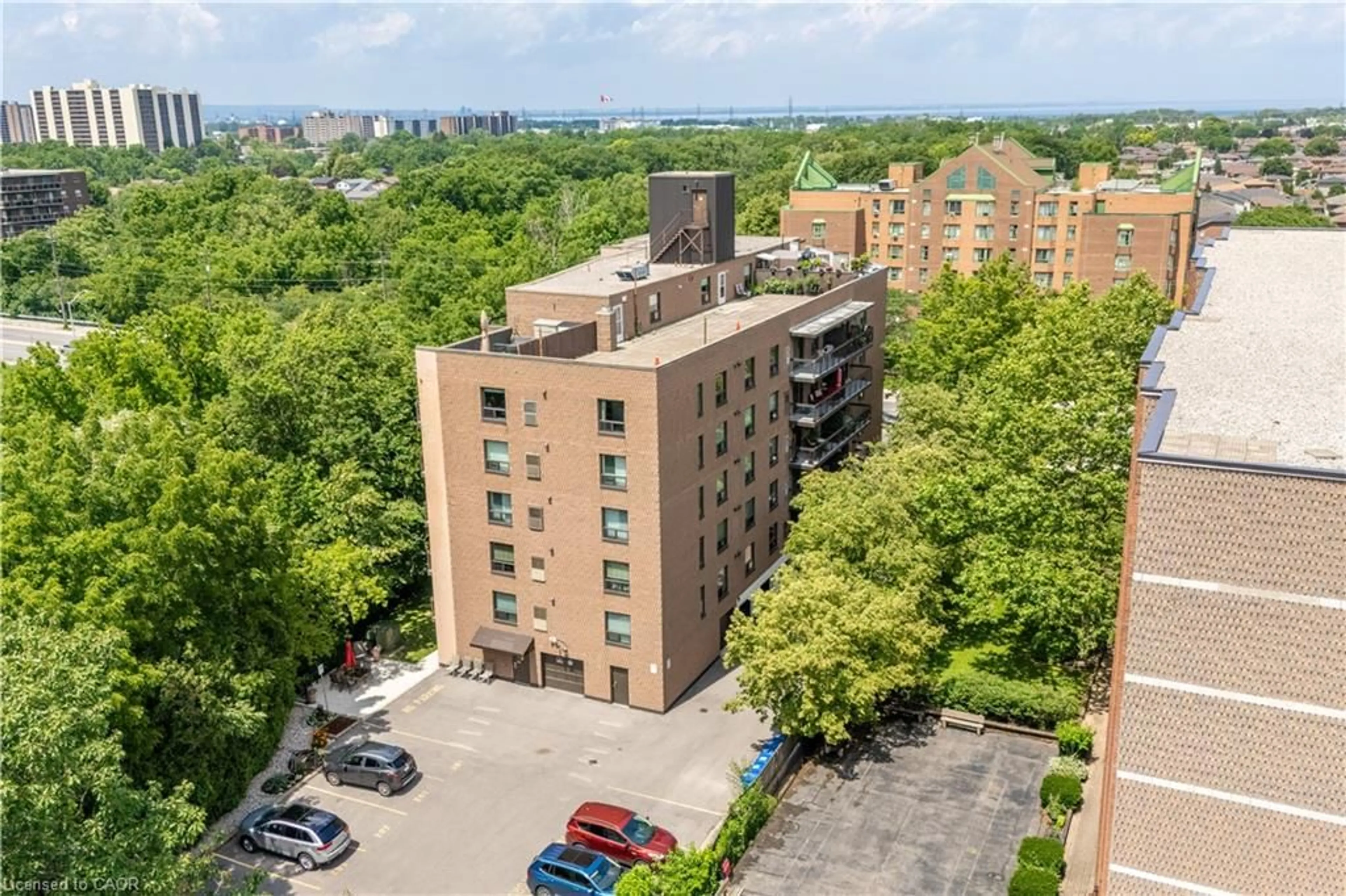 A pic from outside/outdoor area/front of a property/back of a property/a pic from drone, city buildings view from balcony for 966 Queenston Rd #204, Stoney Creek Ontario L8G 1B7