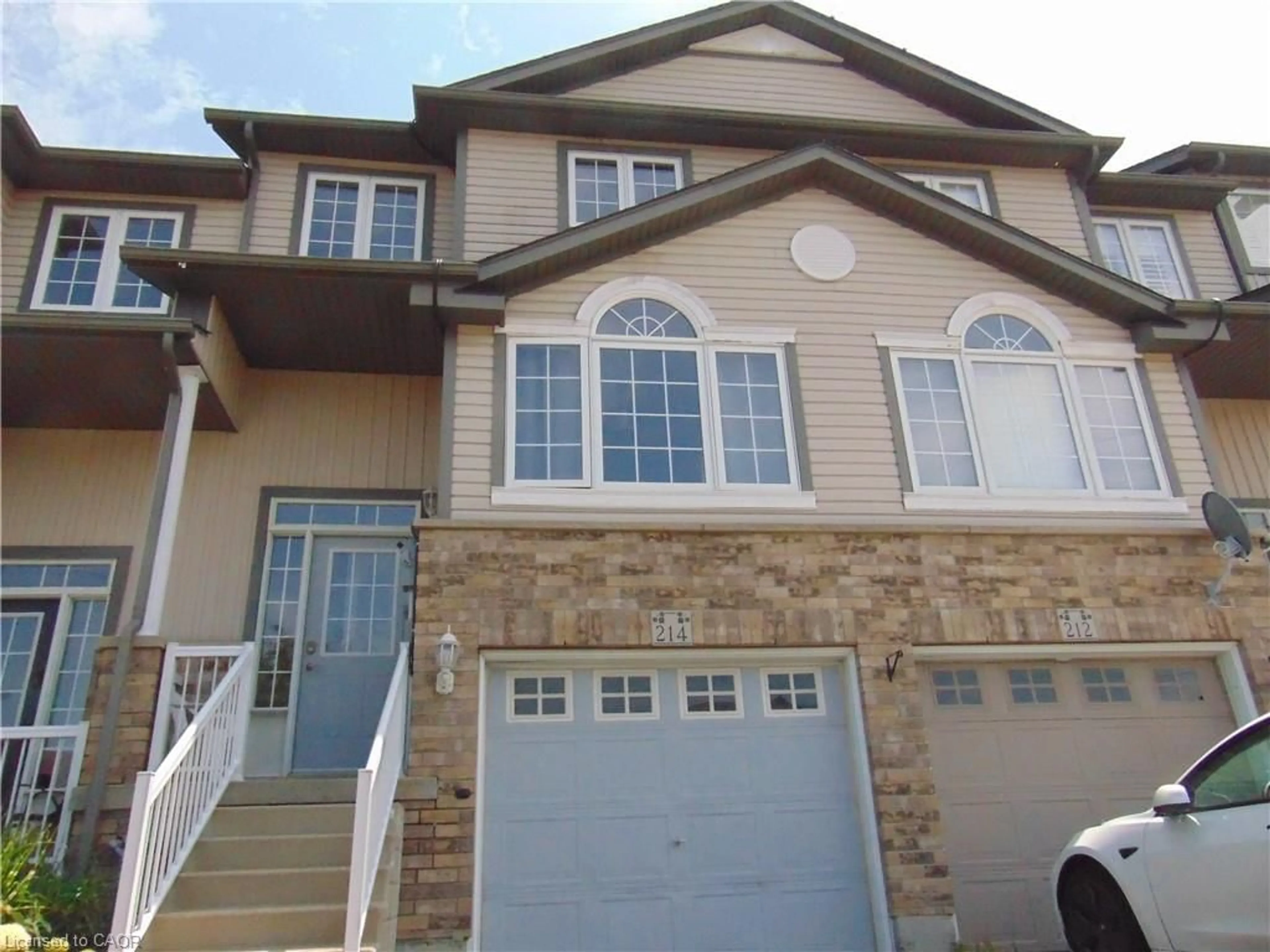 Home with vinyl exterior material, street for 214 Snowdrop Cres, Kitchener Ontario N2E 4C2