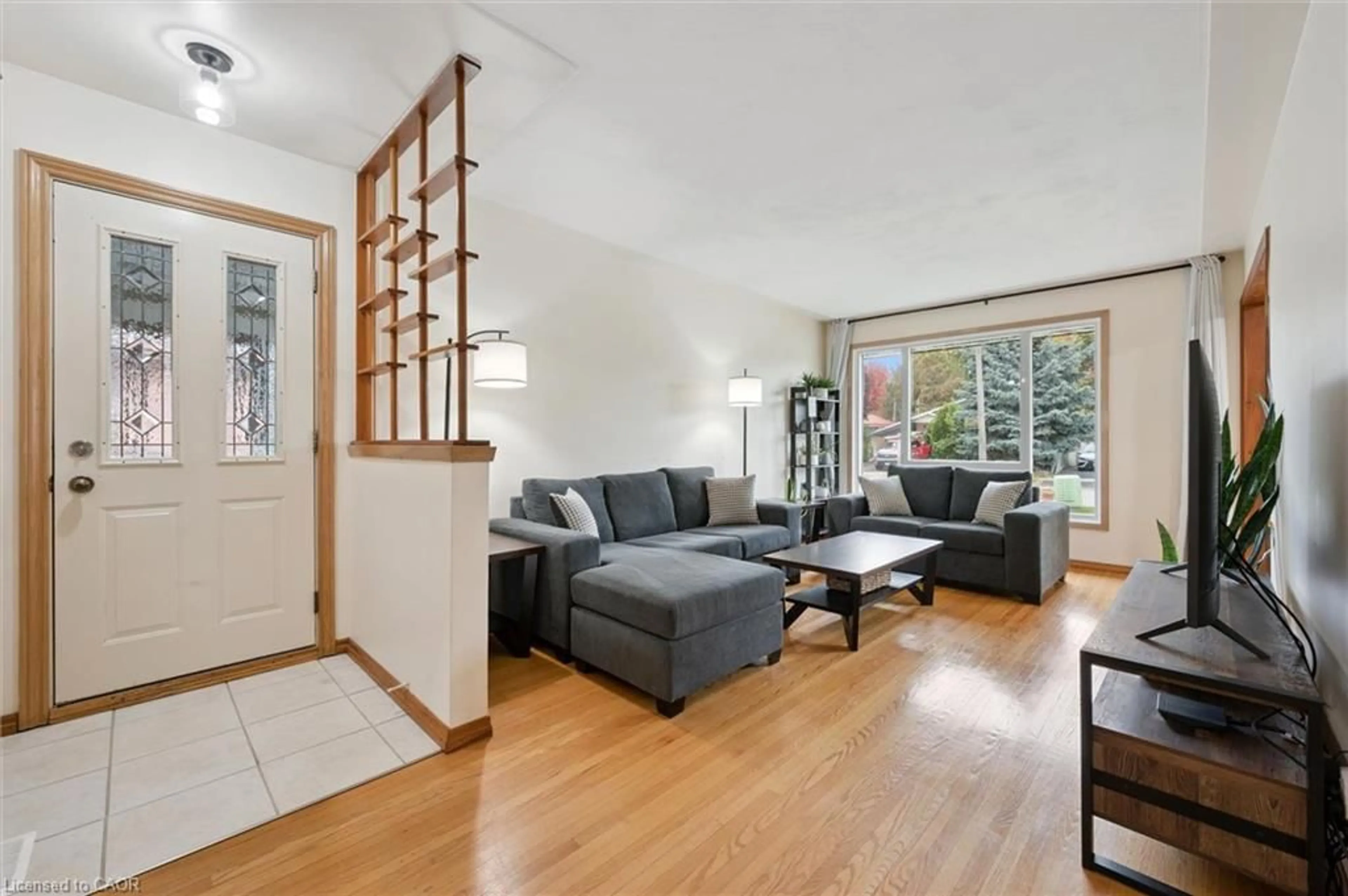Living room with furniture, wood/laminate floor for 269 Ross Ave, Kitchener Ontario N2A 1V7
