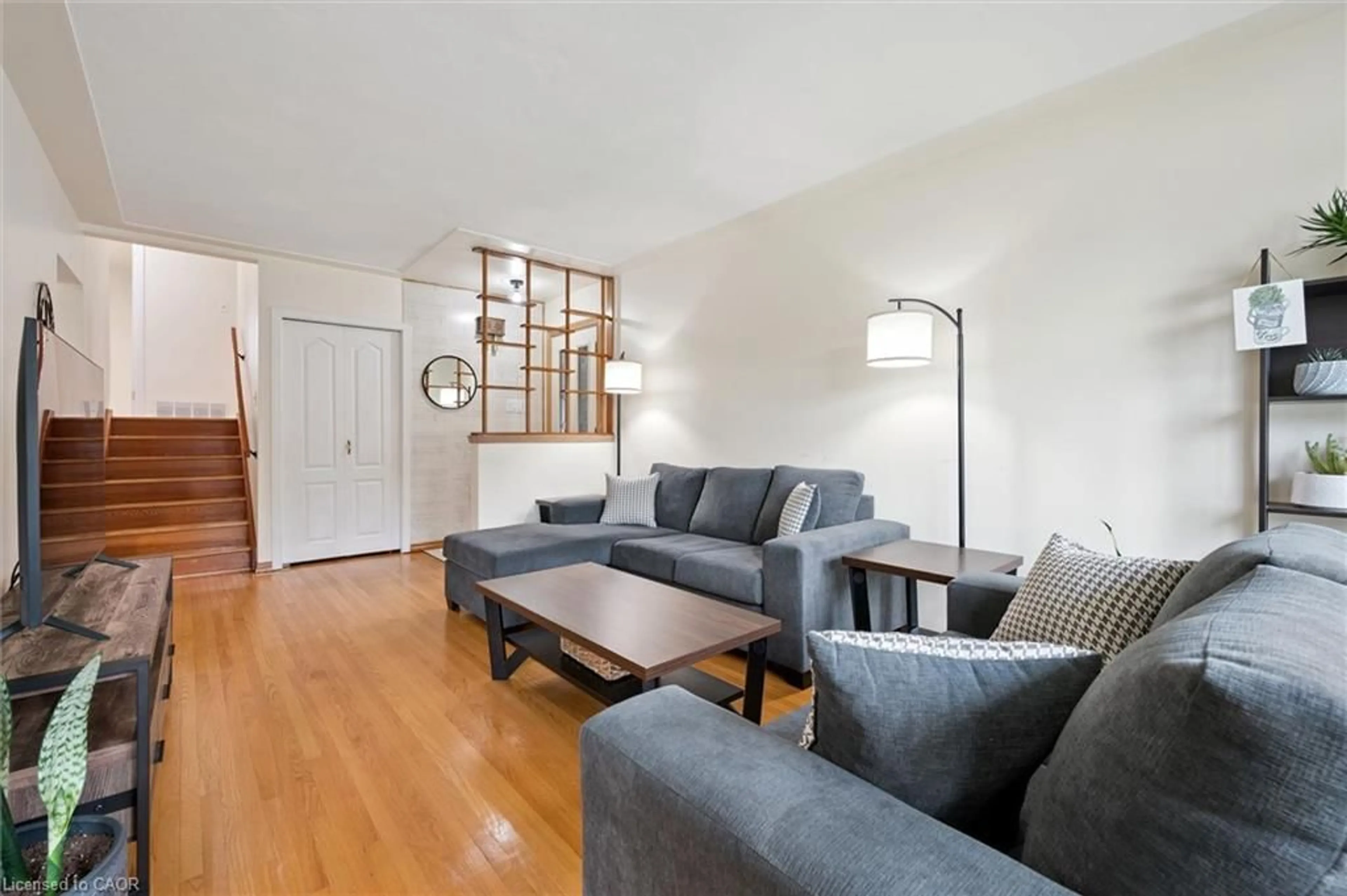 Living room with furniture, wood/laminate floor for 269 Ross Ave, Kitchener Ontario N2A 1V7