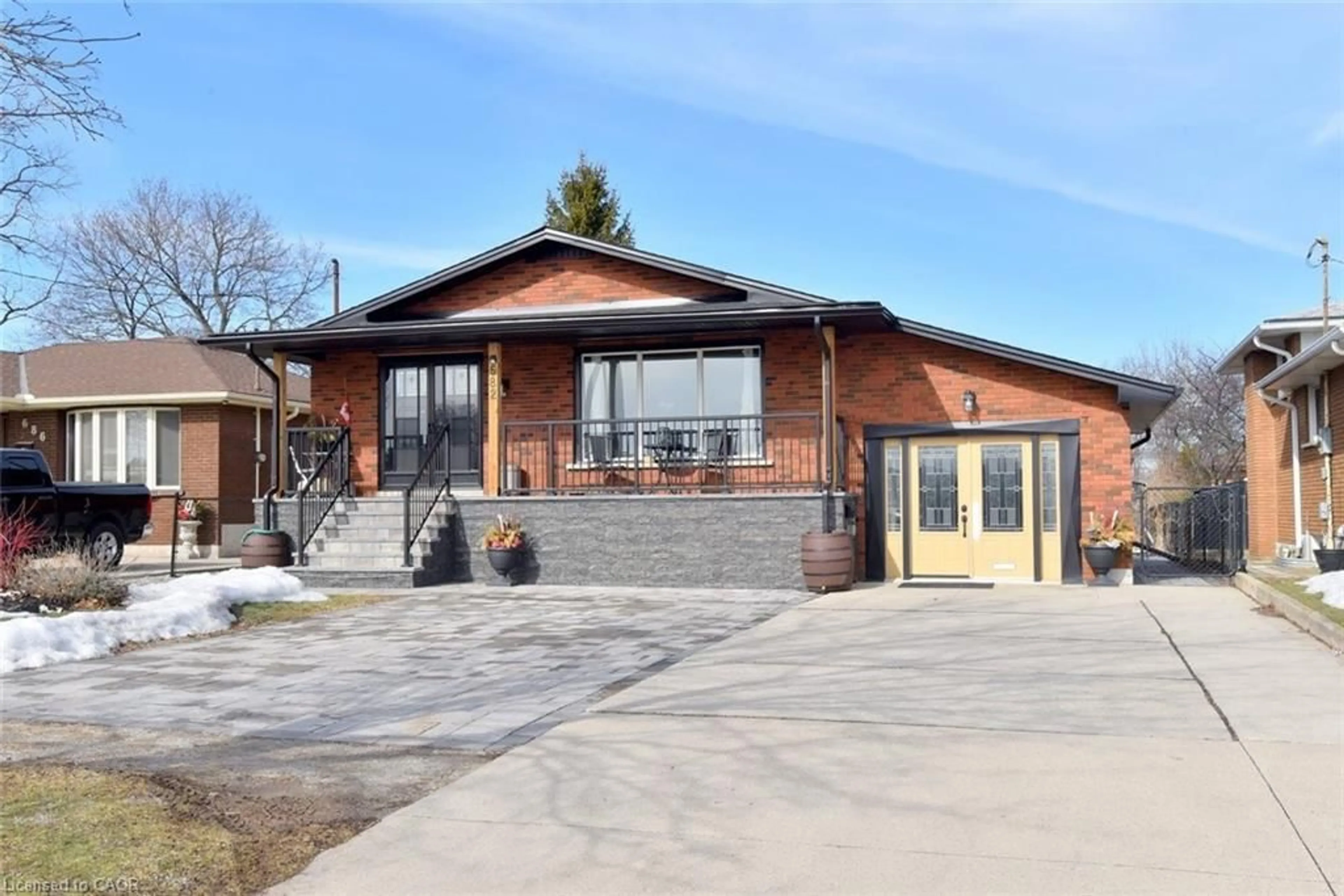 Home with brick exterior material, street for 682 Mohawk Rd, Hamilton Ontario L9C 1X8