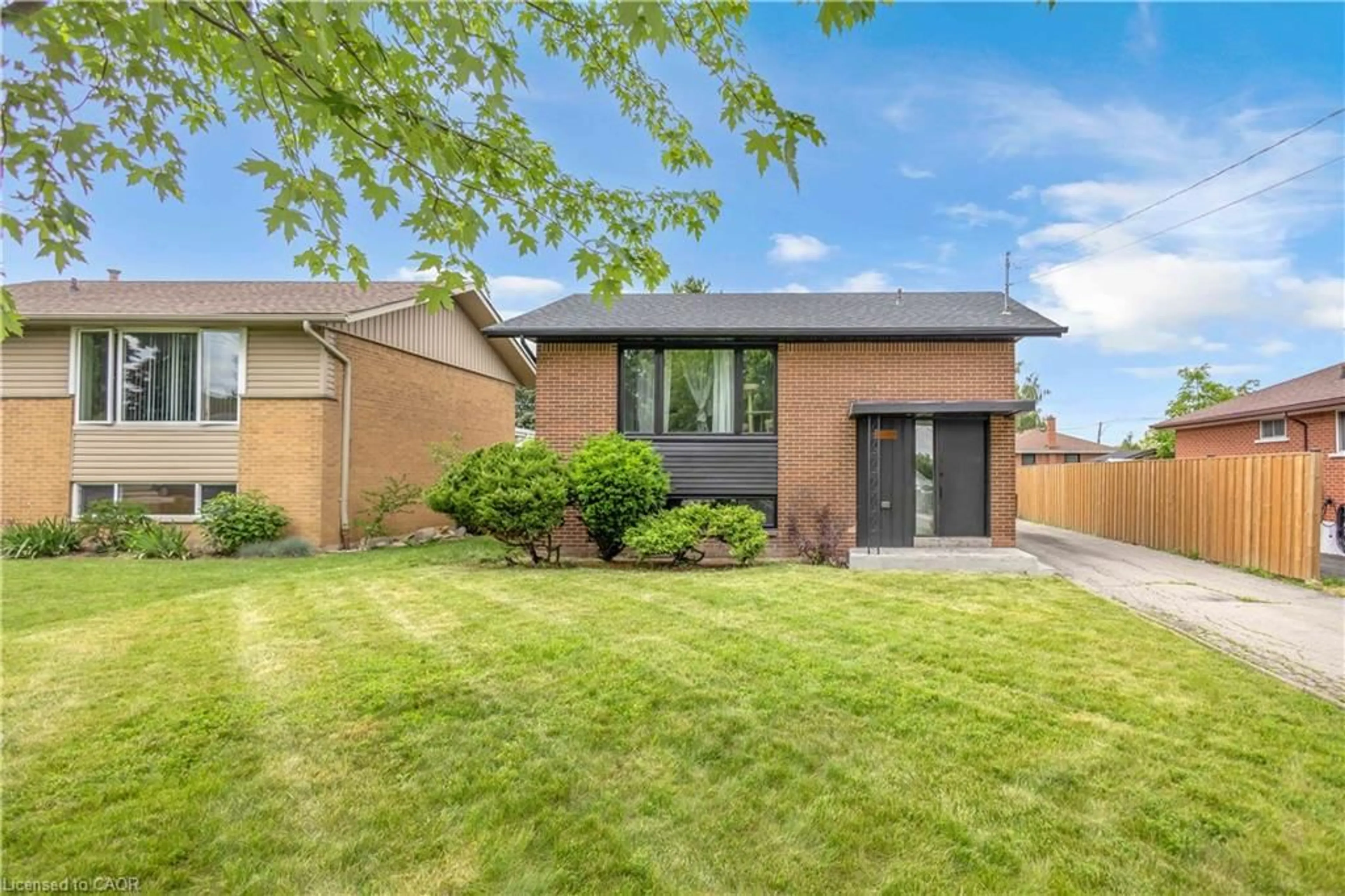 Home with brick exterior material, street for 253 Fernwood Cres, Hamilton Ontario L8T 3L7