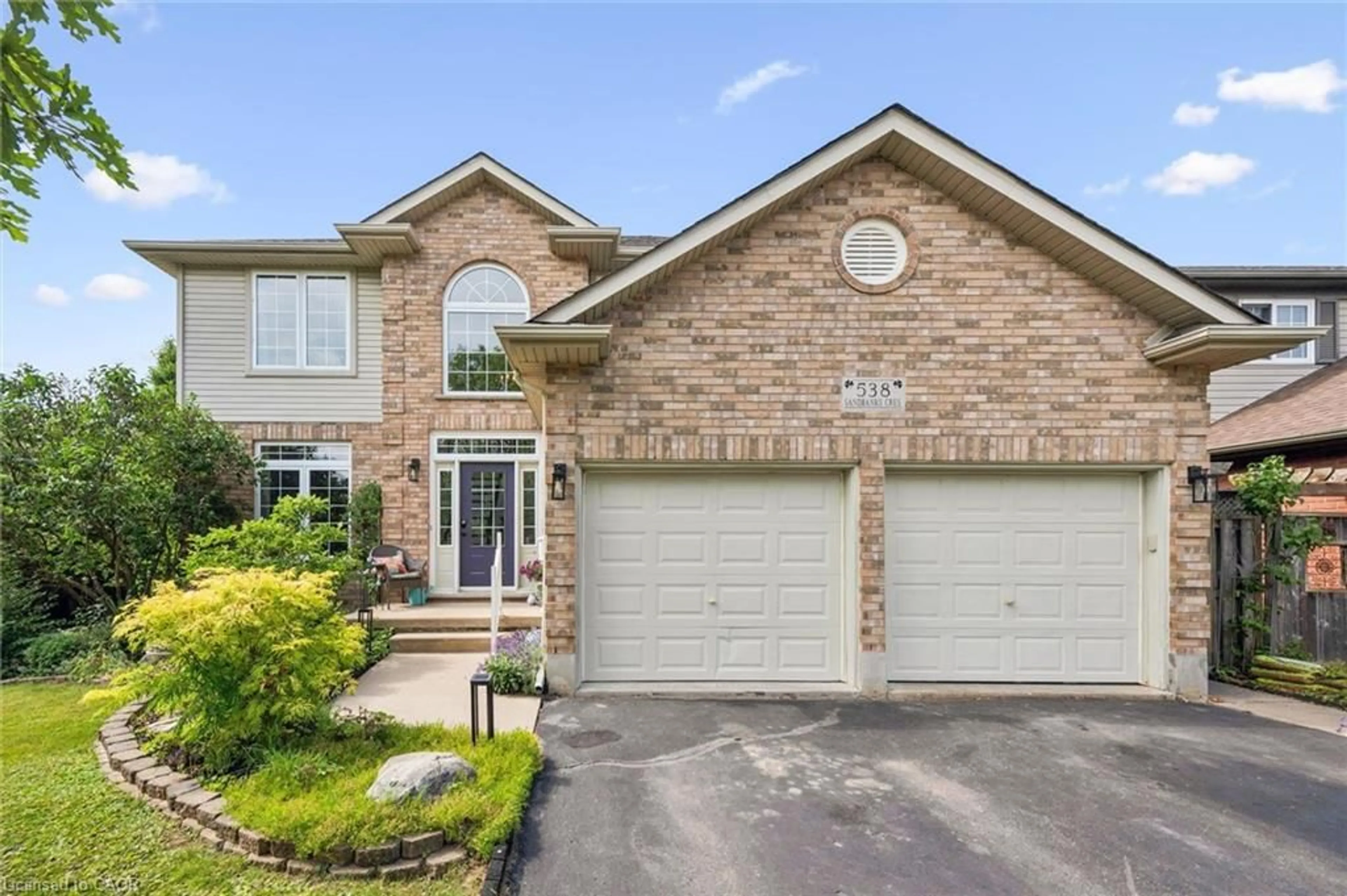 Home with brick exterior material, street for 538 Sandbanks Cres, Waterloo Ontario N2V 2K2