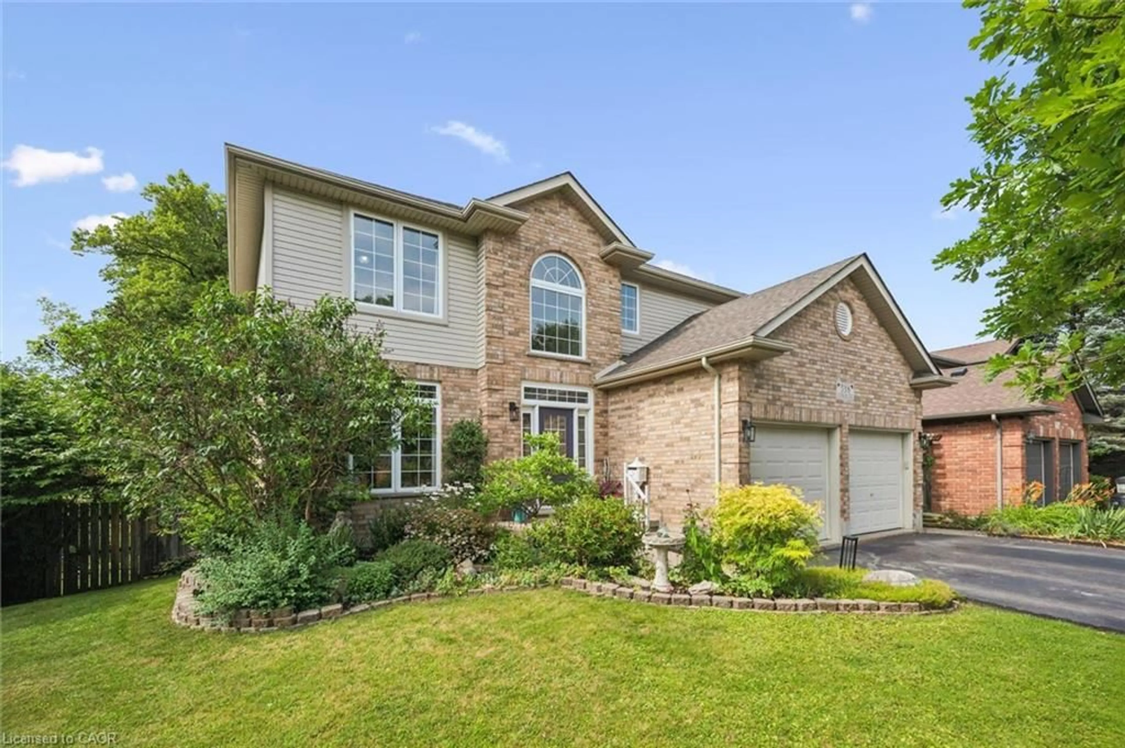 Home with brick exterior material, street for 538 Sandbanks Cres, Waterloo Ontario N2V 2K2