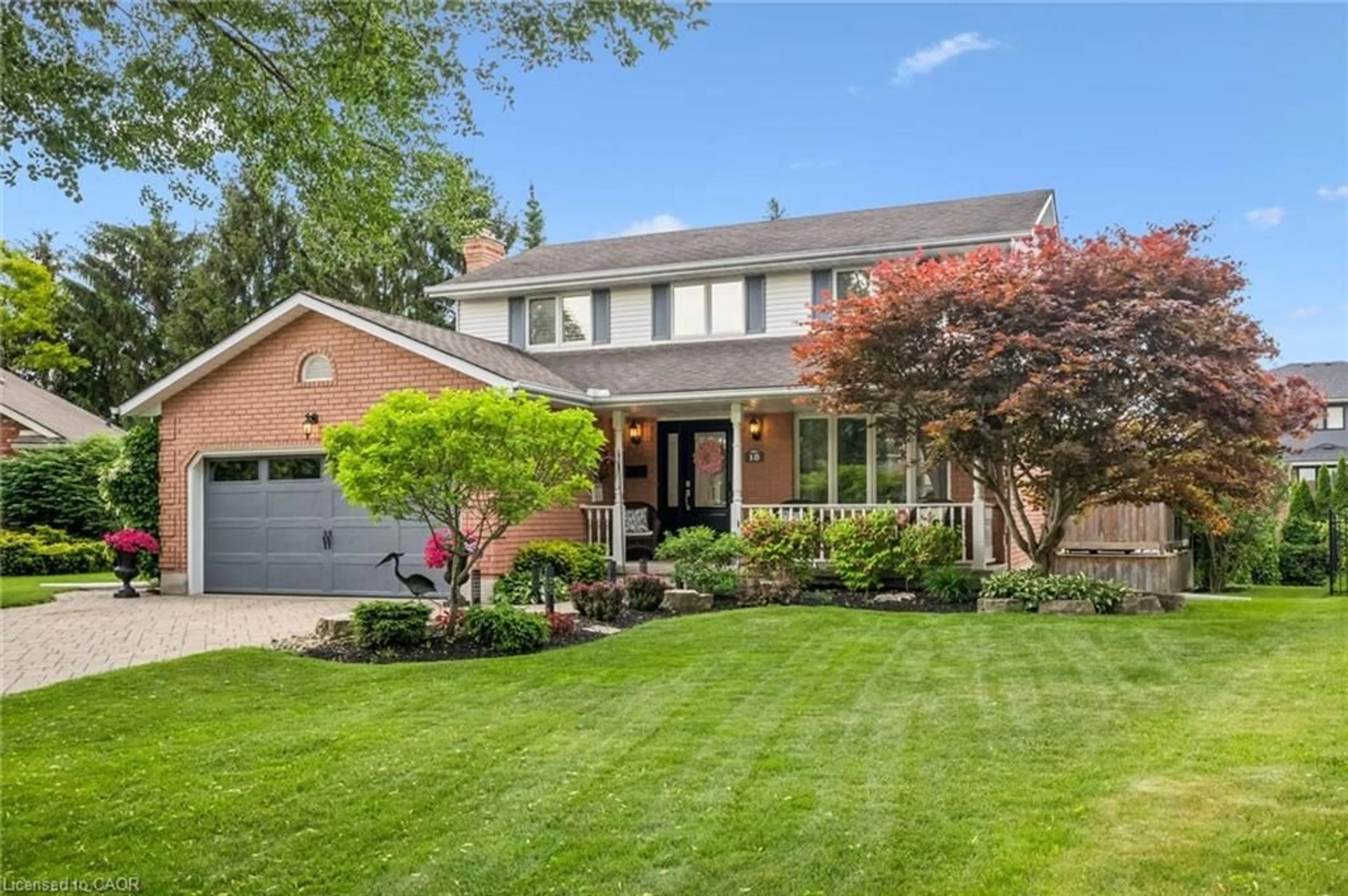 Home with brick exterior material, street for 18 Dunnington Crt, Kitchener Ontario N2A 3M5