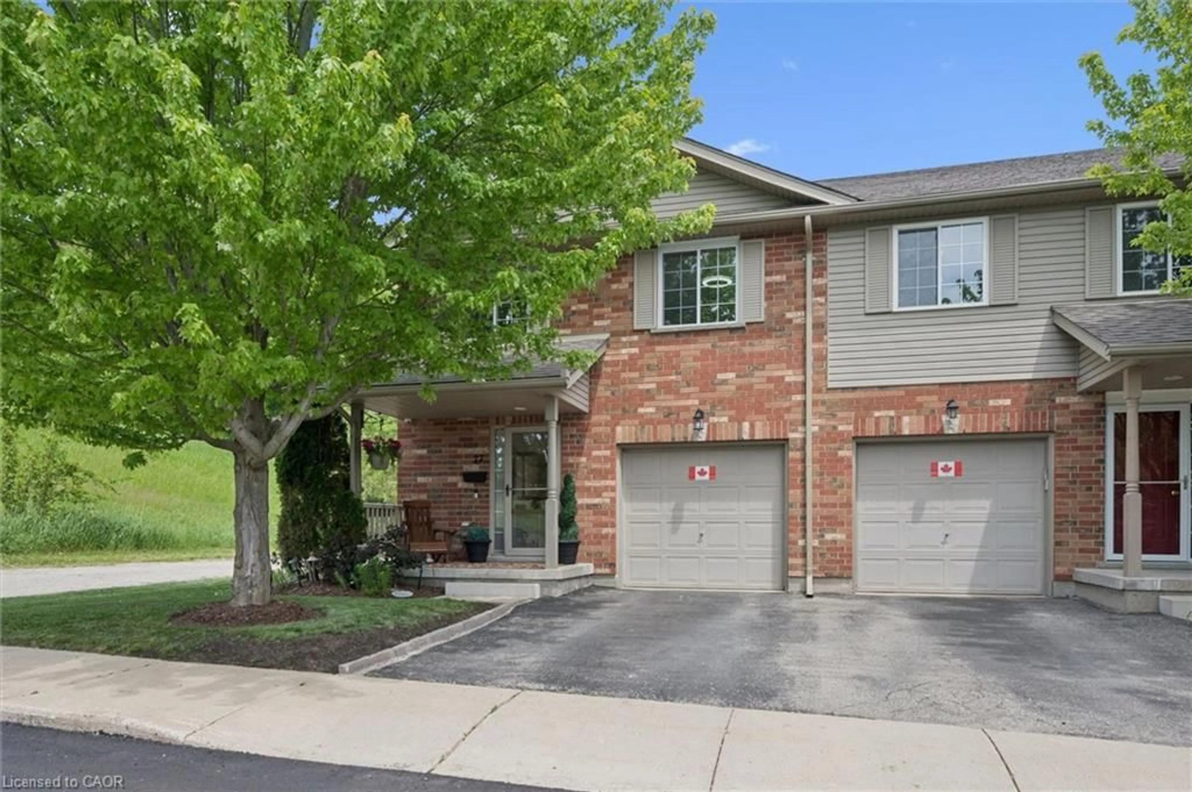 Home with brick exterior material, street for 30 Bryan Crt #27, Kitchener Ontario N2A 4J5