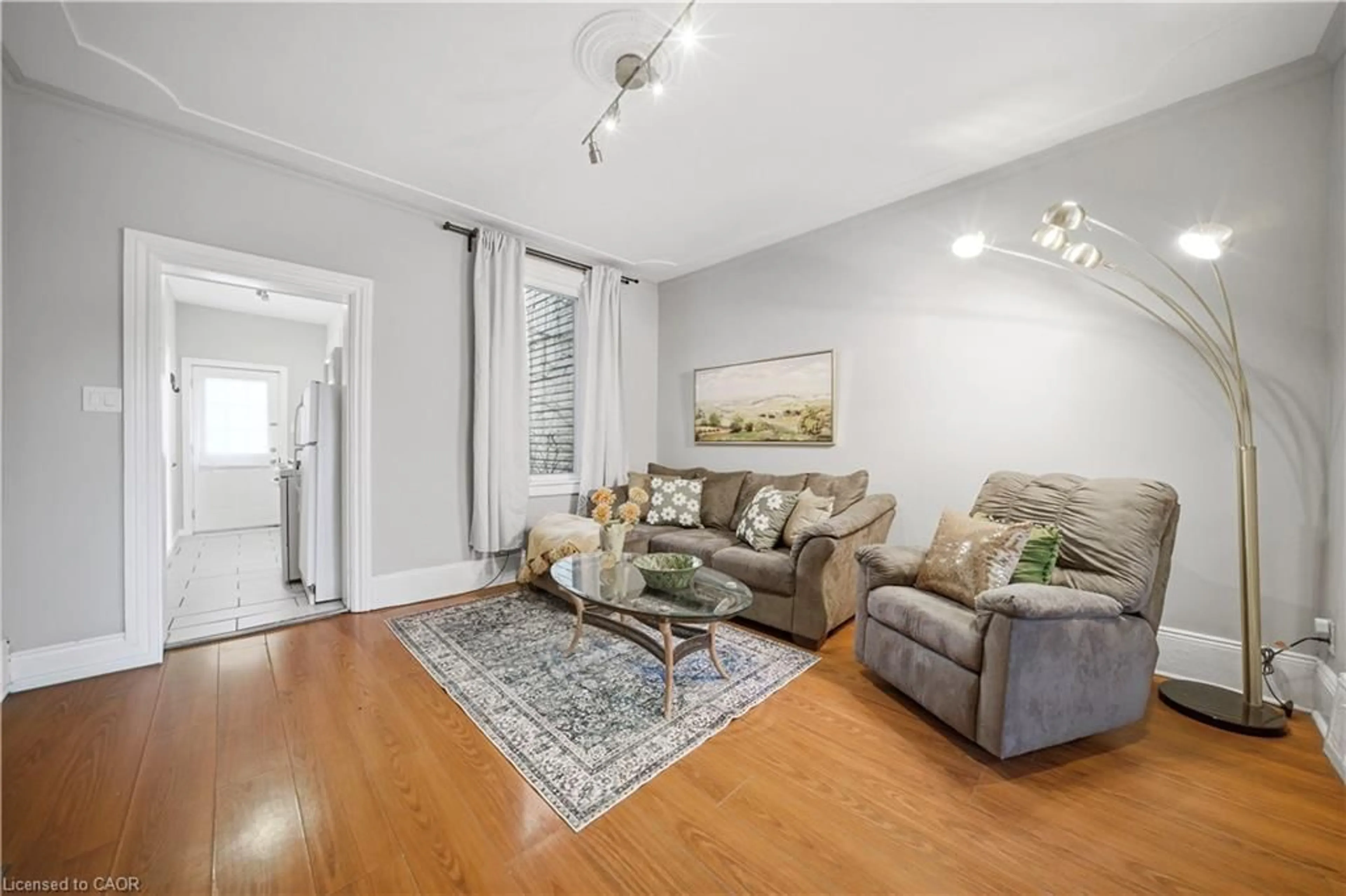 Living room with furniture, unknown for 107 Queen St, Hamilton Ontario L8P 3R9
