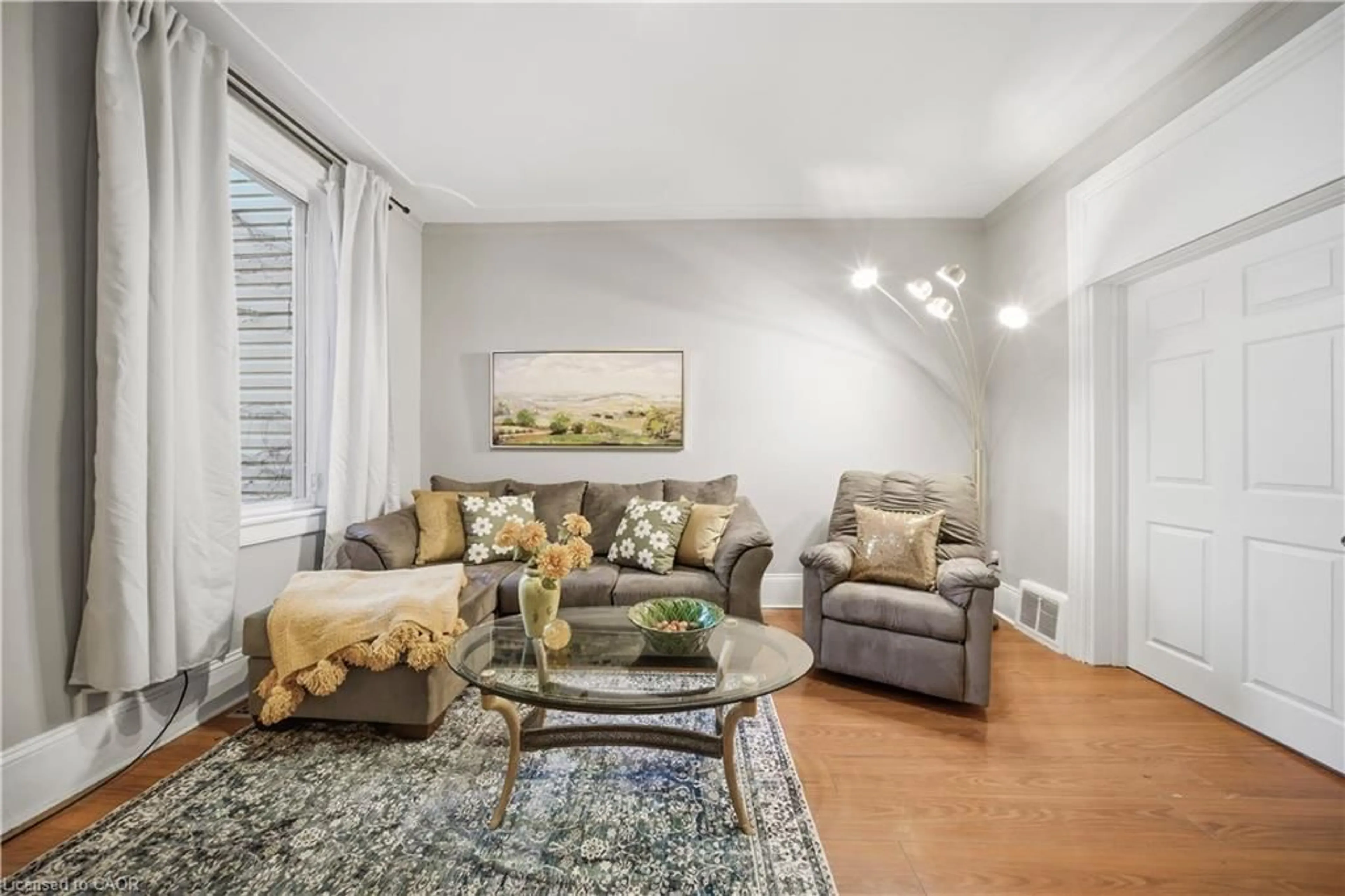 Living room with furniture, unknown for 107 Queen St, Hamilton Ontario L8P 3R9