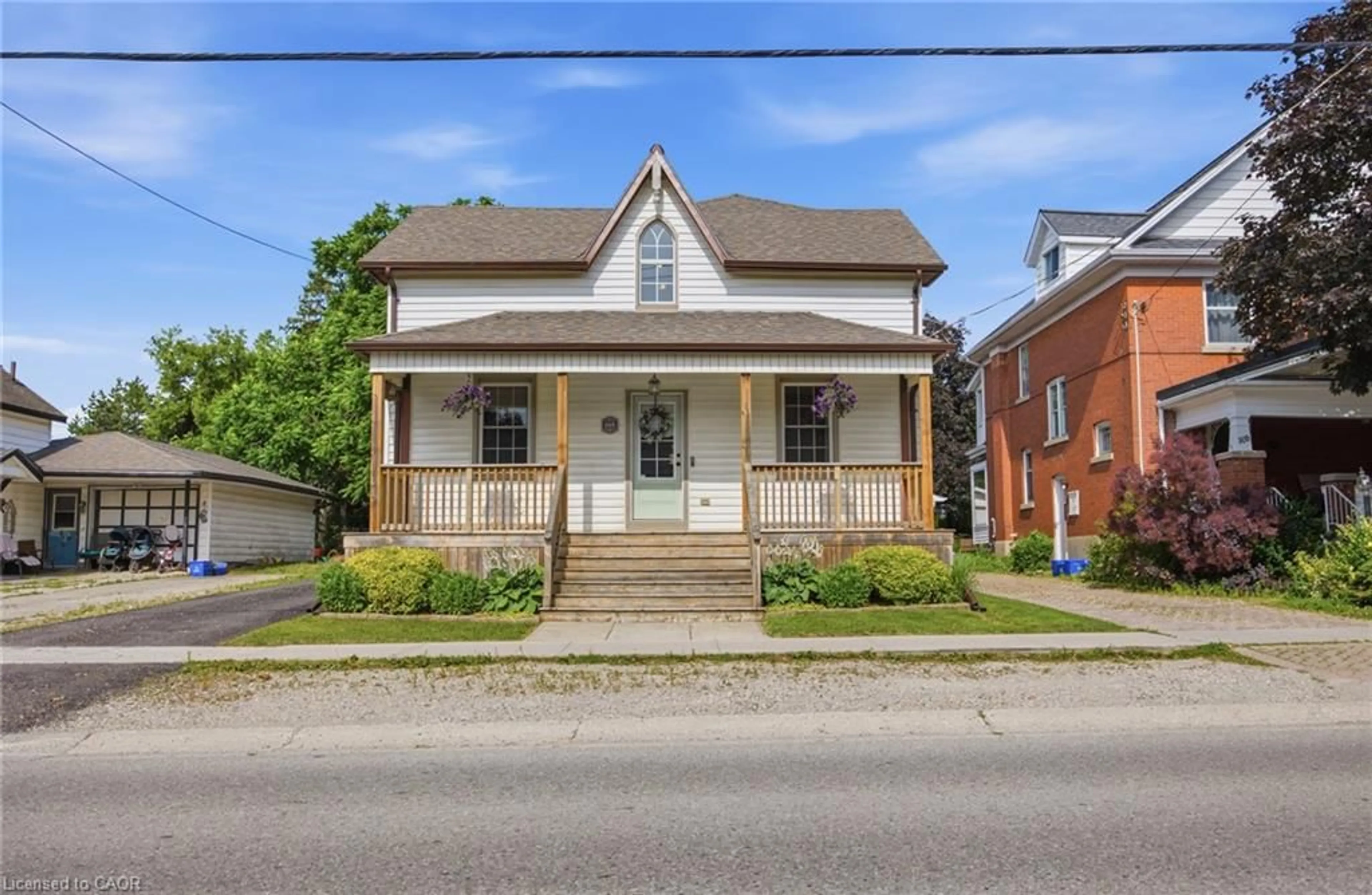 Home with brick exterior material, street for 165 Woodstock St, Tavistock Ontario N0B 2R0