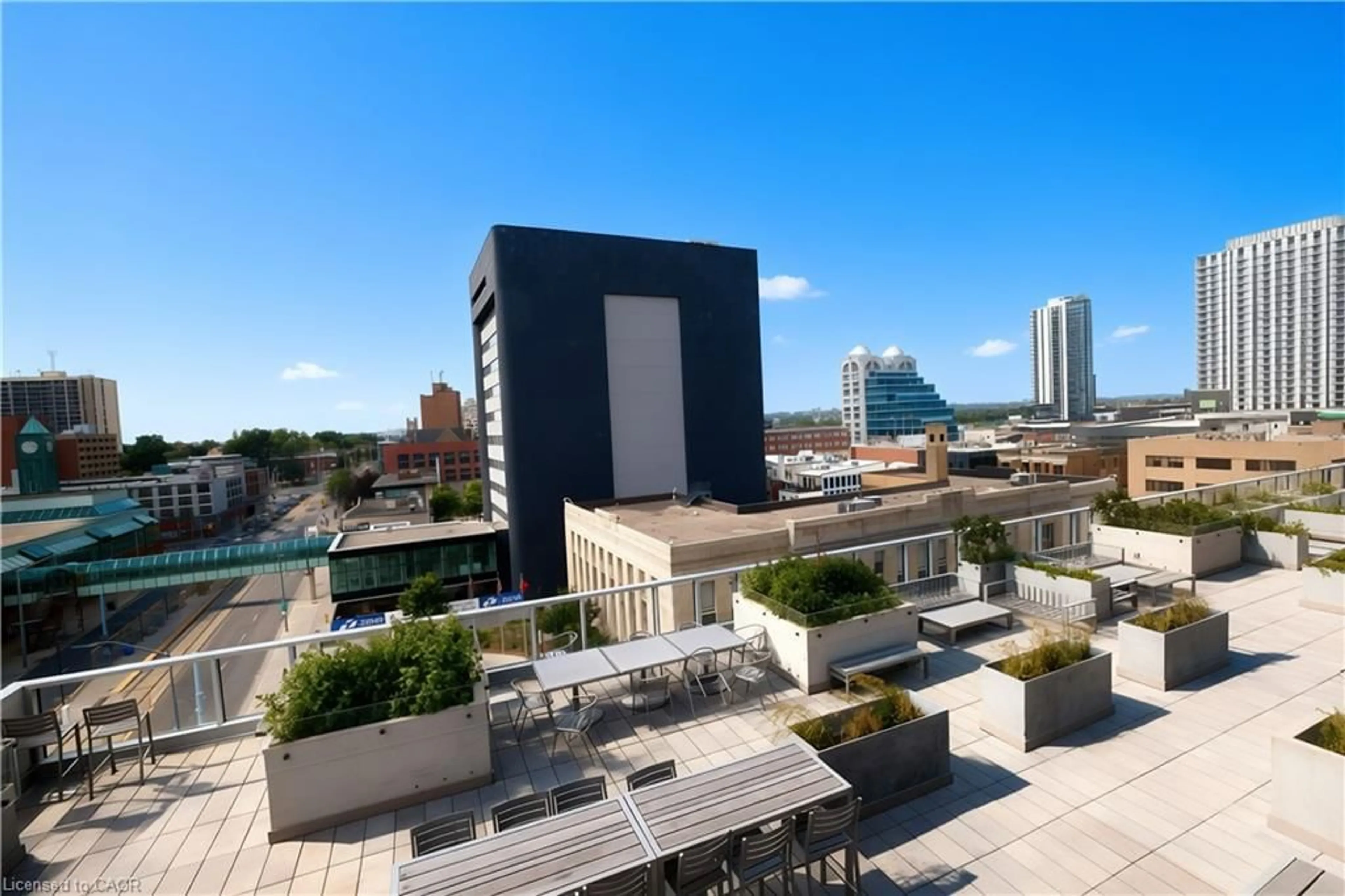 Patio, city buildings view from balcony for 60 Frederick St #1401, Kitchener Ontario N2H 0C7