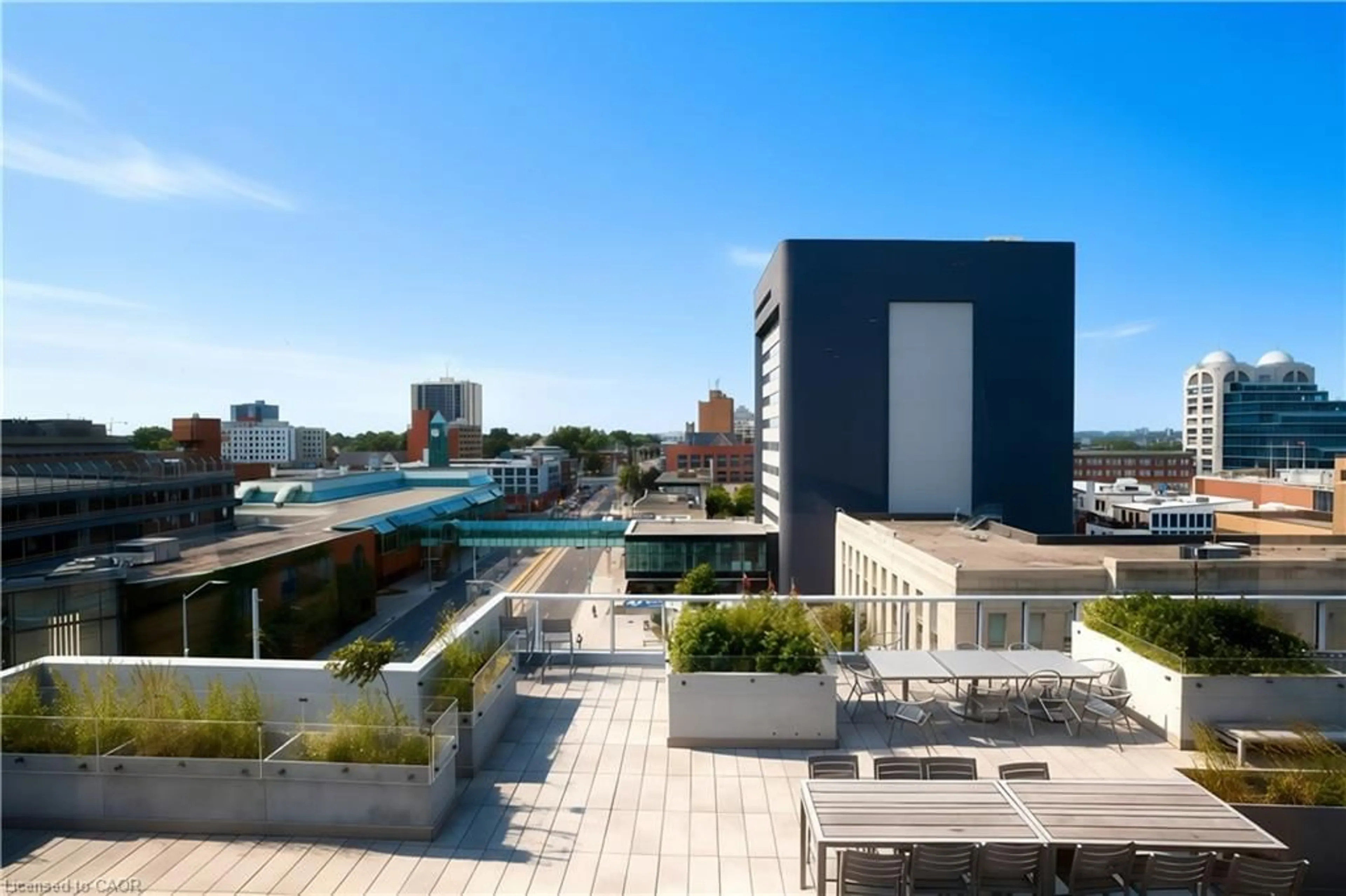 Patio, city buildings view from balcony for 60 Frederick St #1401, Kitchener Ontario N2H 0C7