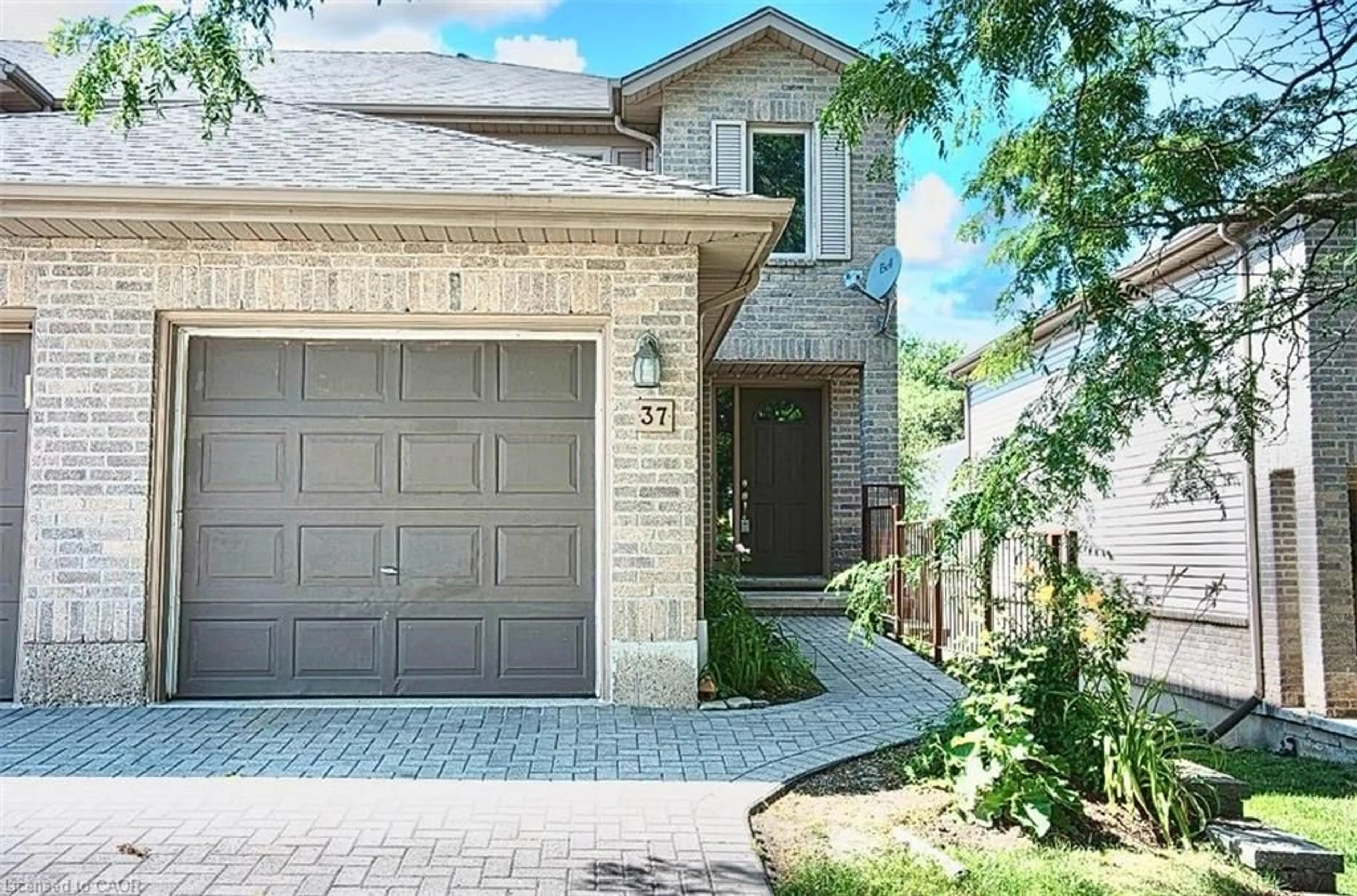 Home with brick exterior material, street for 230 Blackhorne Dr #37, Kitchener Ontario N2E 1Z4