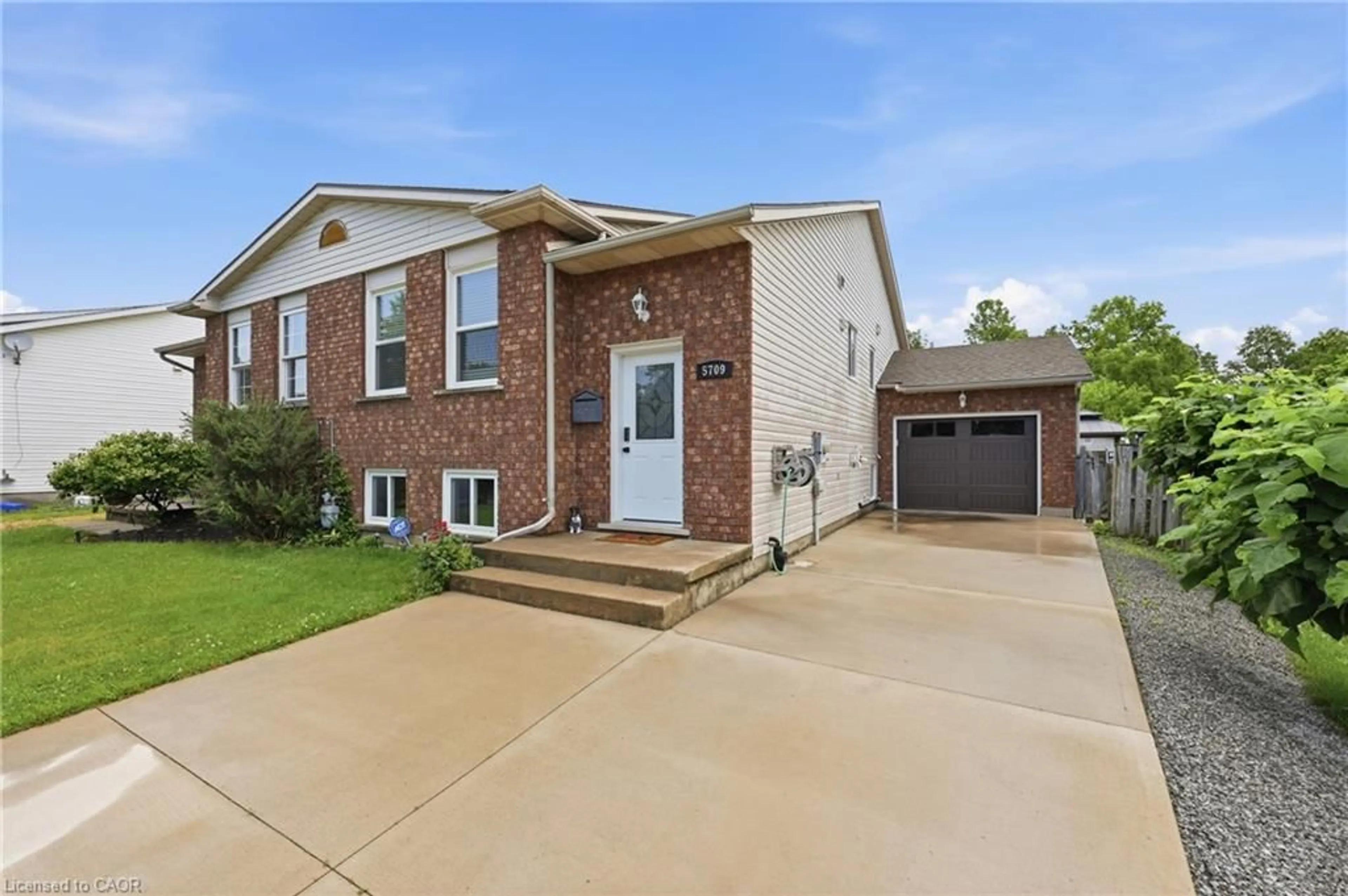 Home with brick exterior material, street for 5709 Deerbrook St, Niagara Falls Ontario L2G 7V6