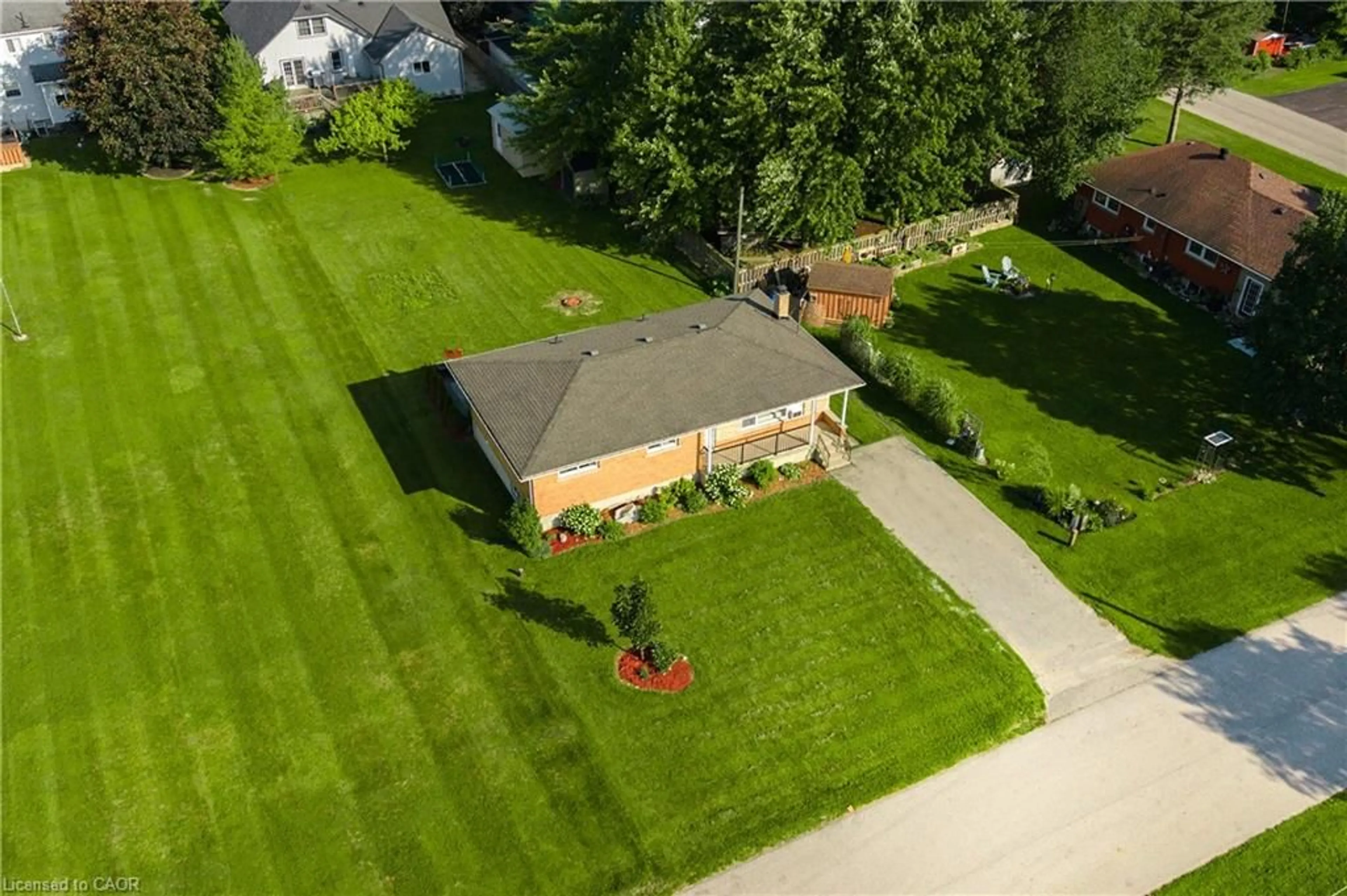 A pic from outside/outdoor area/front of a property/back of a property/a pic from drone, street for 261 King St, Atwood Ontario N0G 1B0