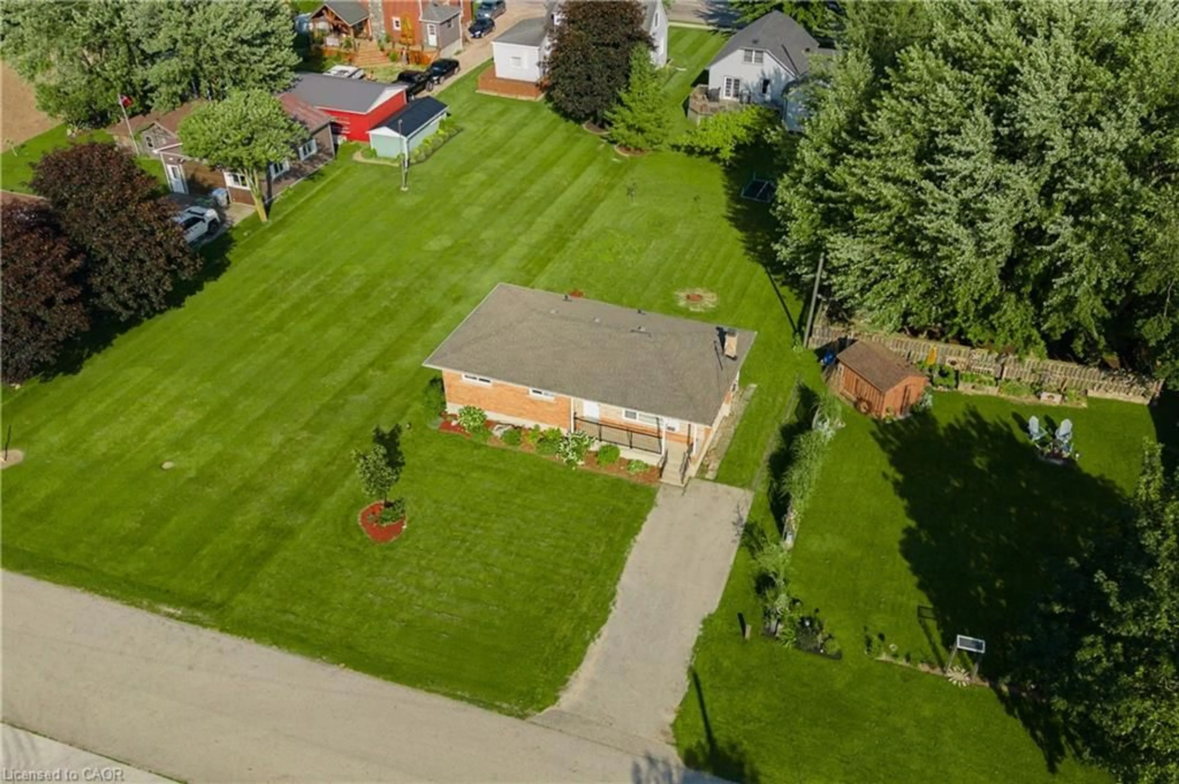 A pic from outside/outdoor area/front of a property/back of a property/a pic from drone, street for 261 King St, Atwood Ontario N0G 1B0