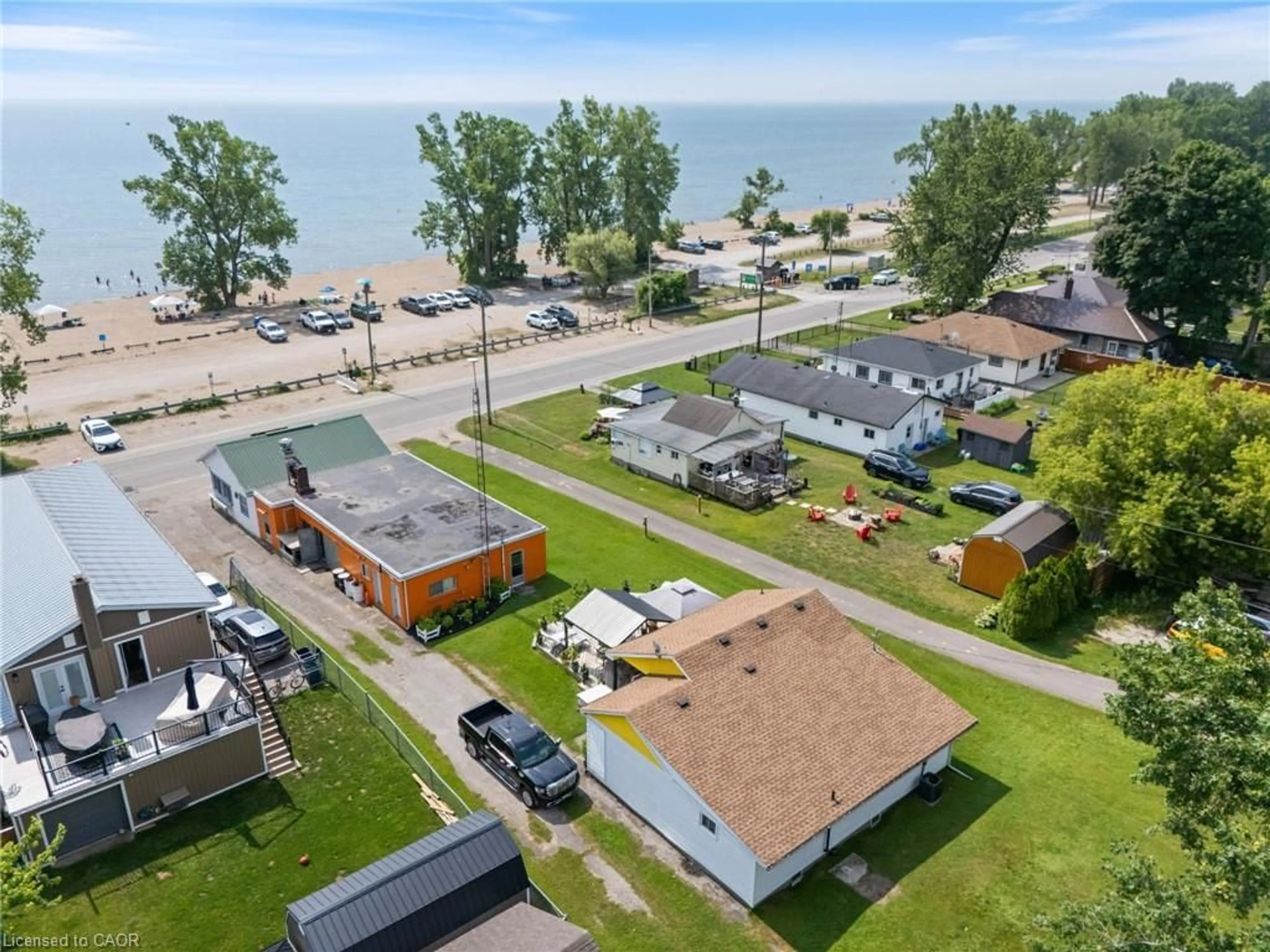 A pic from outside/outdoor area/front of a property/back of a property/a pic from drone, water/lake/river/ocean view for 103 Cedar Dr, Turkey Point Ontario N0E 1T0