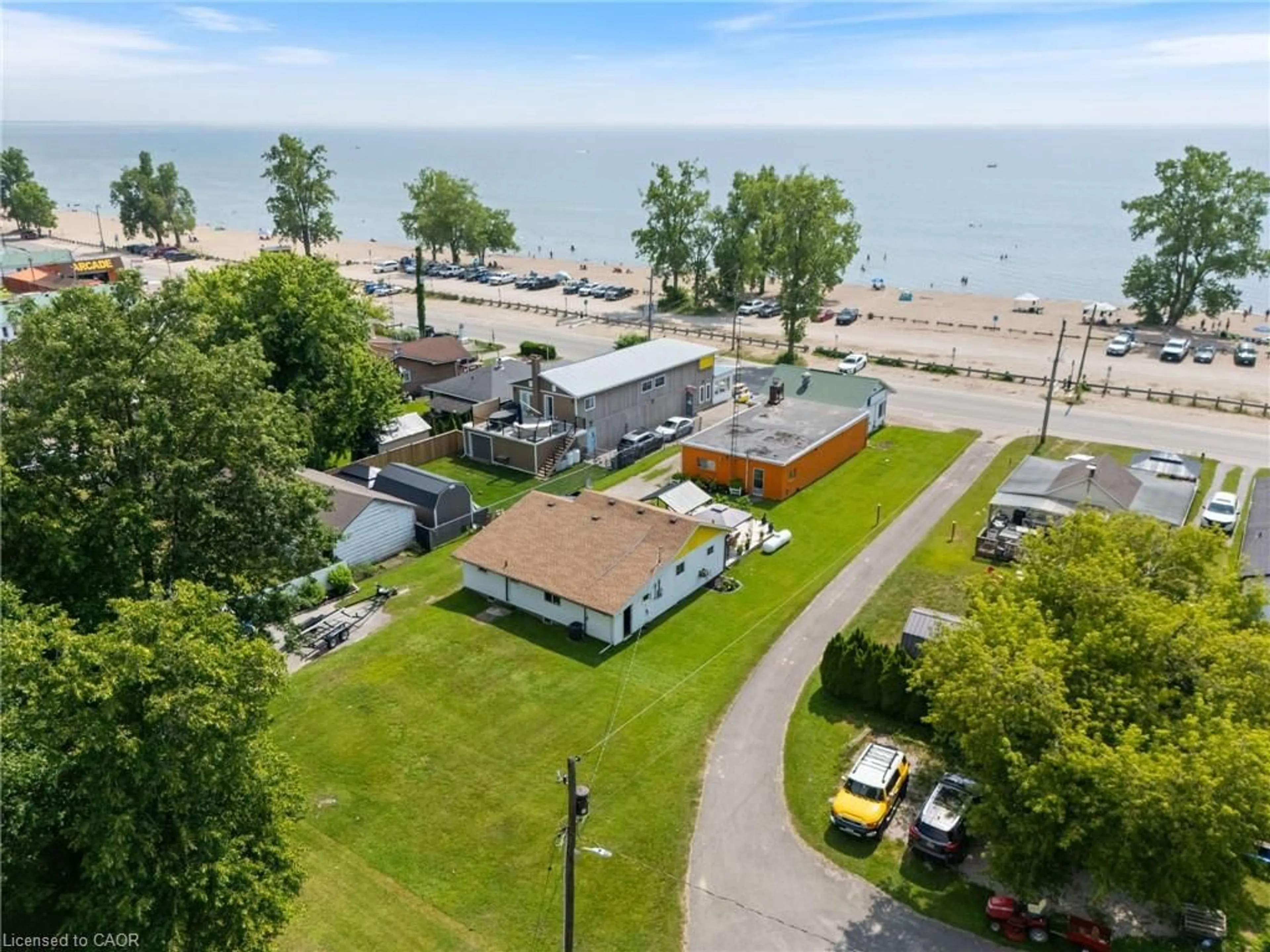 A pic from outside/outdoor area/front of a property/back of a property/a pic from drone, water/lake/river/ocean view for 103 Cedar Dr, Turkey Point Ontario N0E 1T0