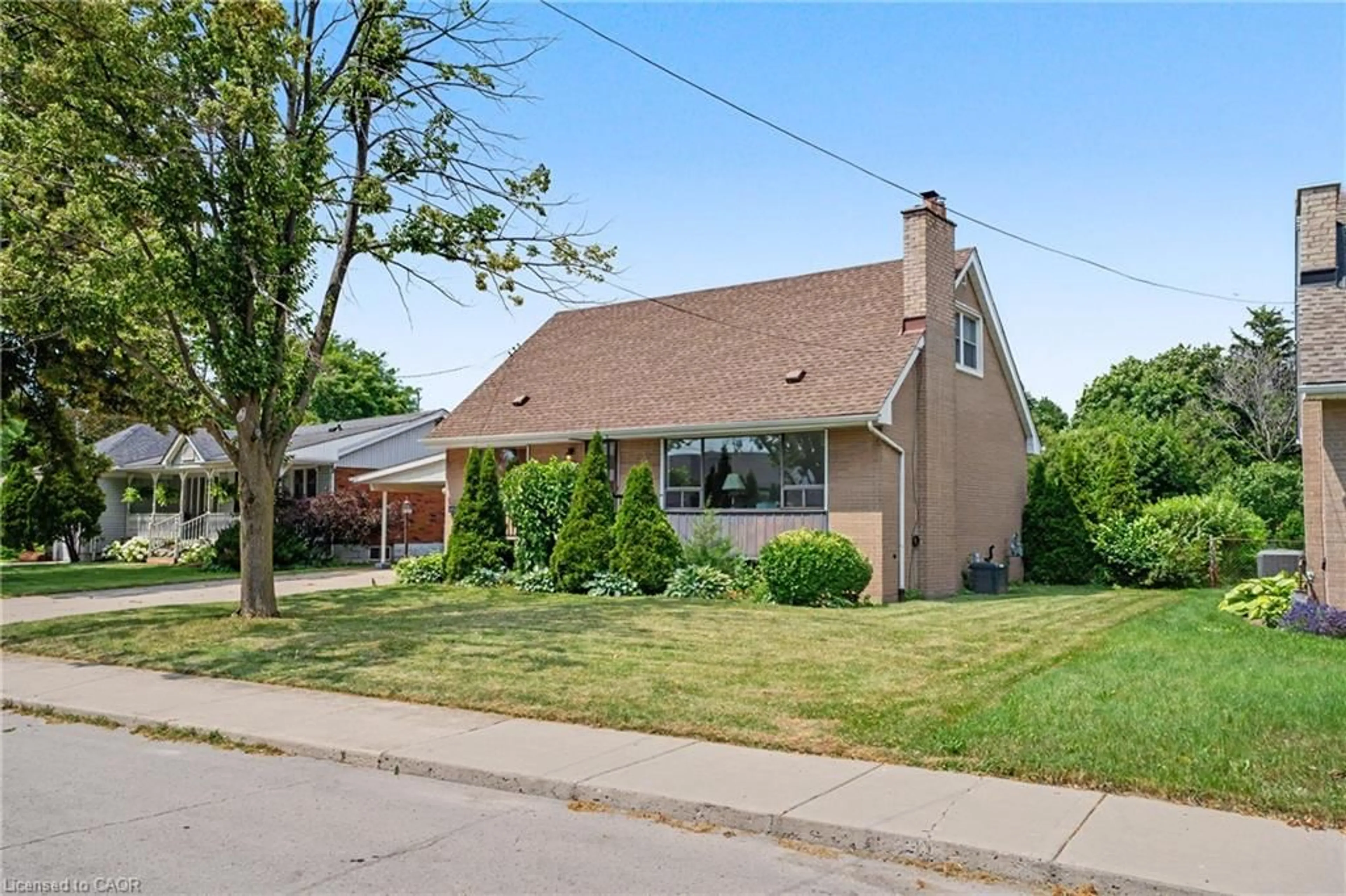 Home with brick exterior material, street for 11 Marshall Ave, Hamilton Ontario L8T 1W9