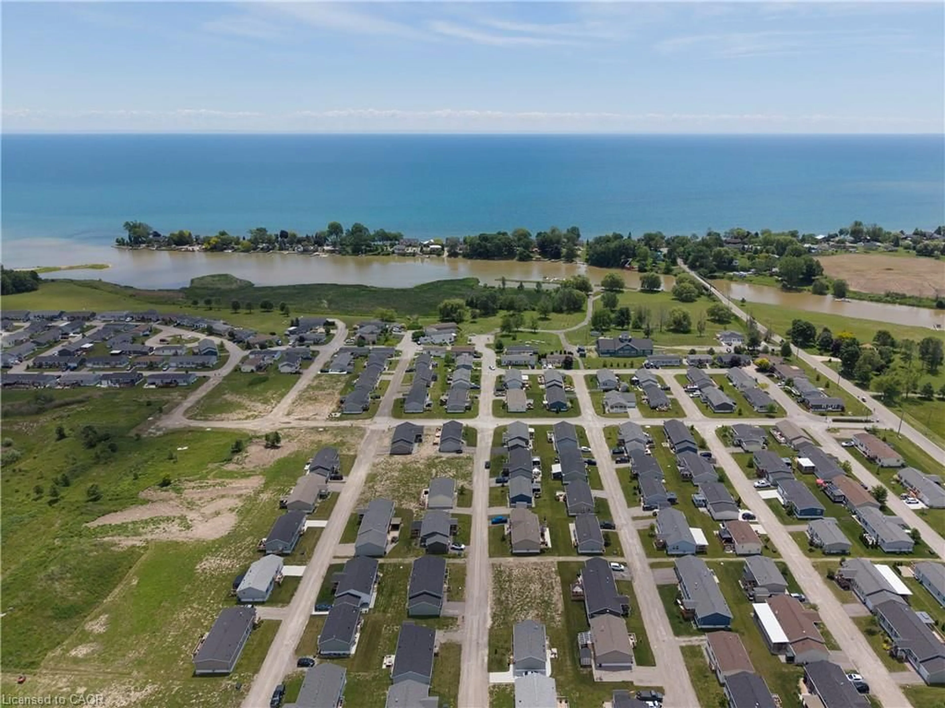 A pic from outside/outdoor area/front of a property/back of a property/a pic from drone, water/lake/river/ocean view for 10 Bent Willow Crt, Haldimand County Ontario N0A 1L0