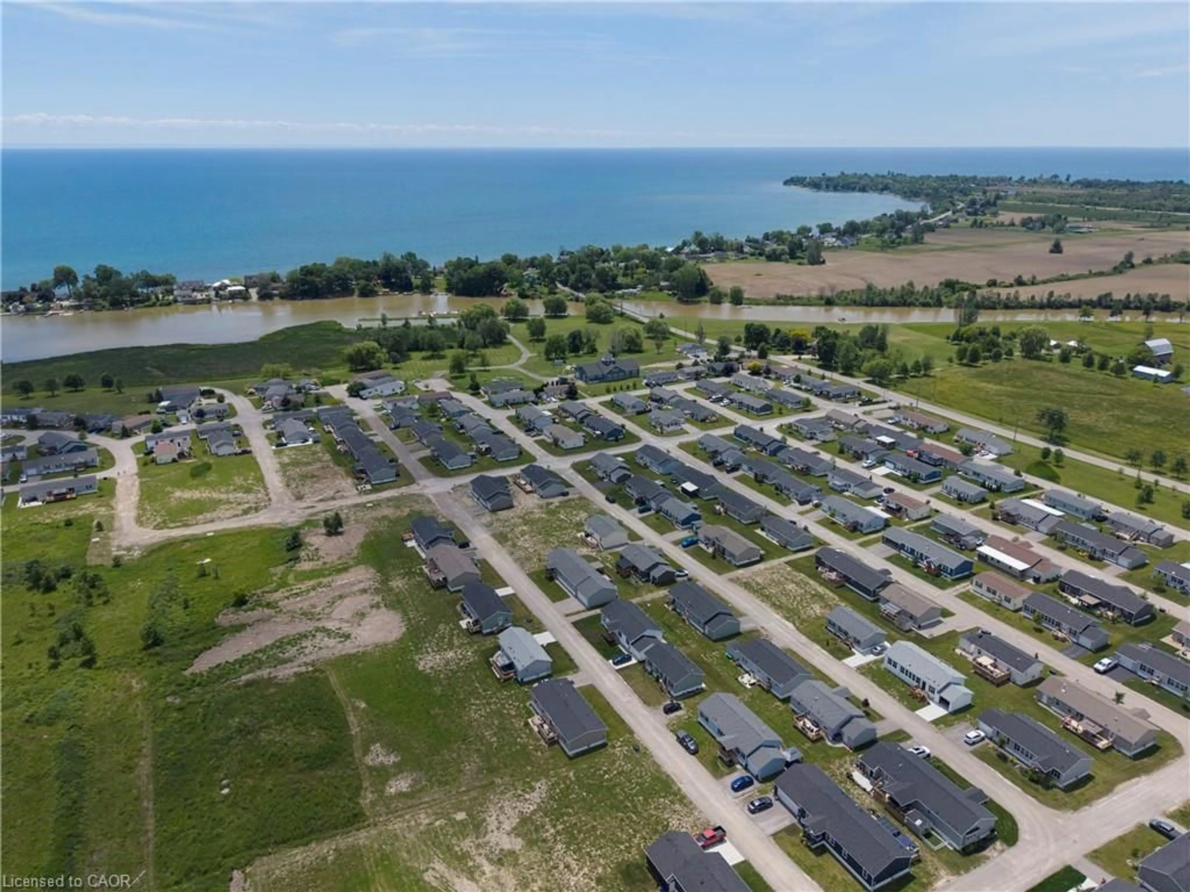 A pic from outside/outdoor area/front of a property/back of a property/a pic from drone, water/lake/river/ocean view for 10 Bent Willow Crt, Haldimand County Ontario N0A 1L0