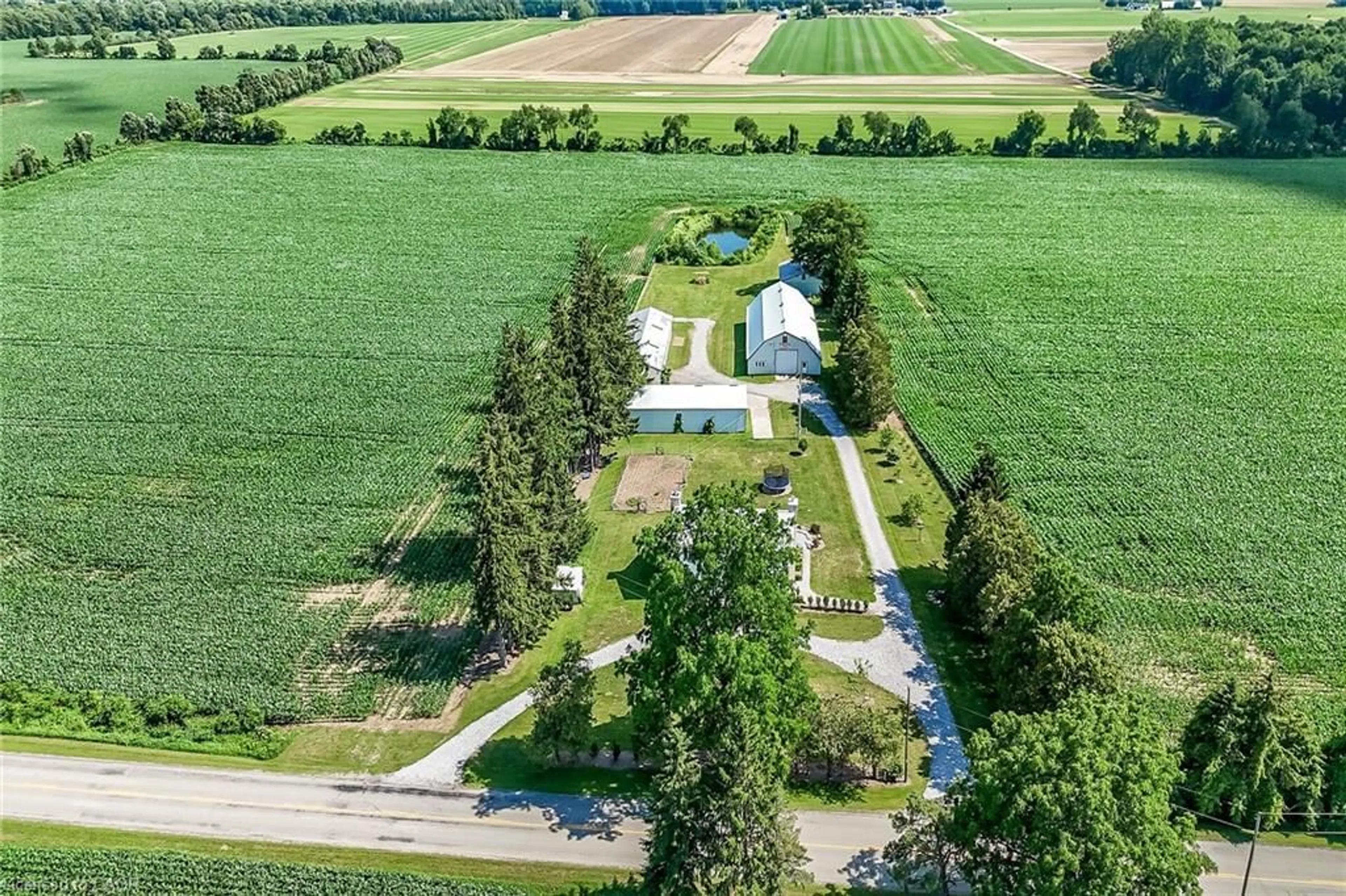 A pic from outside/outdoor area/front of a property/back of a property/a pic from drone, unknown for 91 Golf Links Rd, Burford Ontario N0E 1A0