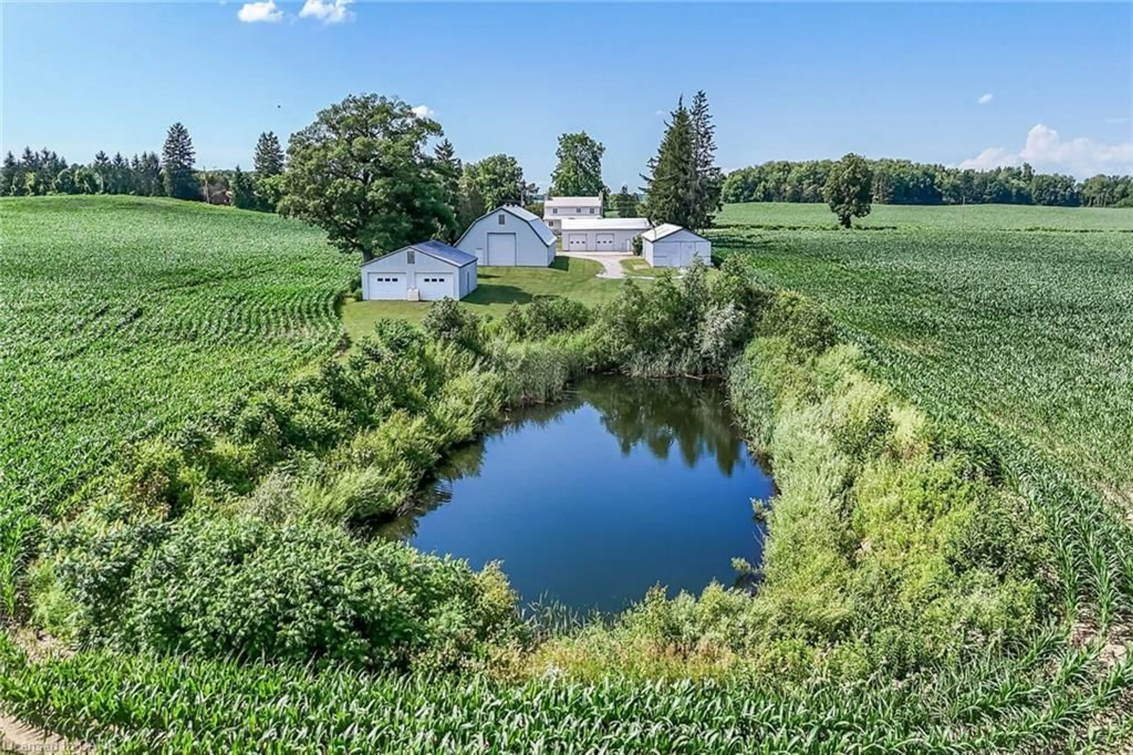 A pic from outside/outdoor area/front of a property/back of a property/a pic from drone, water/lake/river/ocean view for 91 Golf Links Rd, Burford Ontario N0E 1A0
