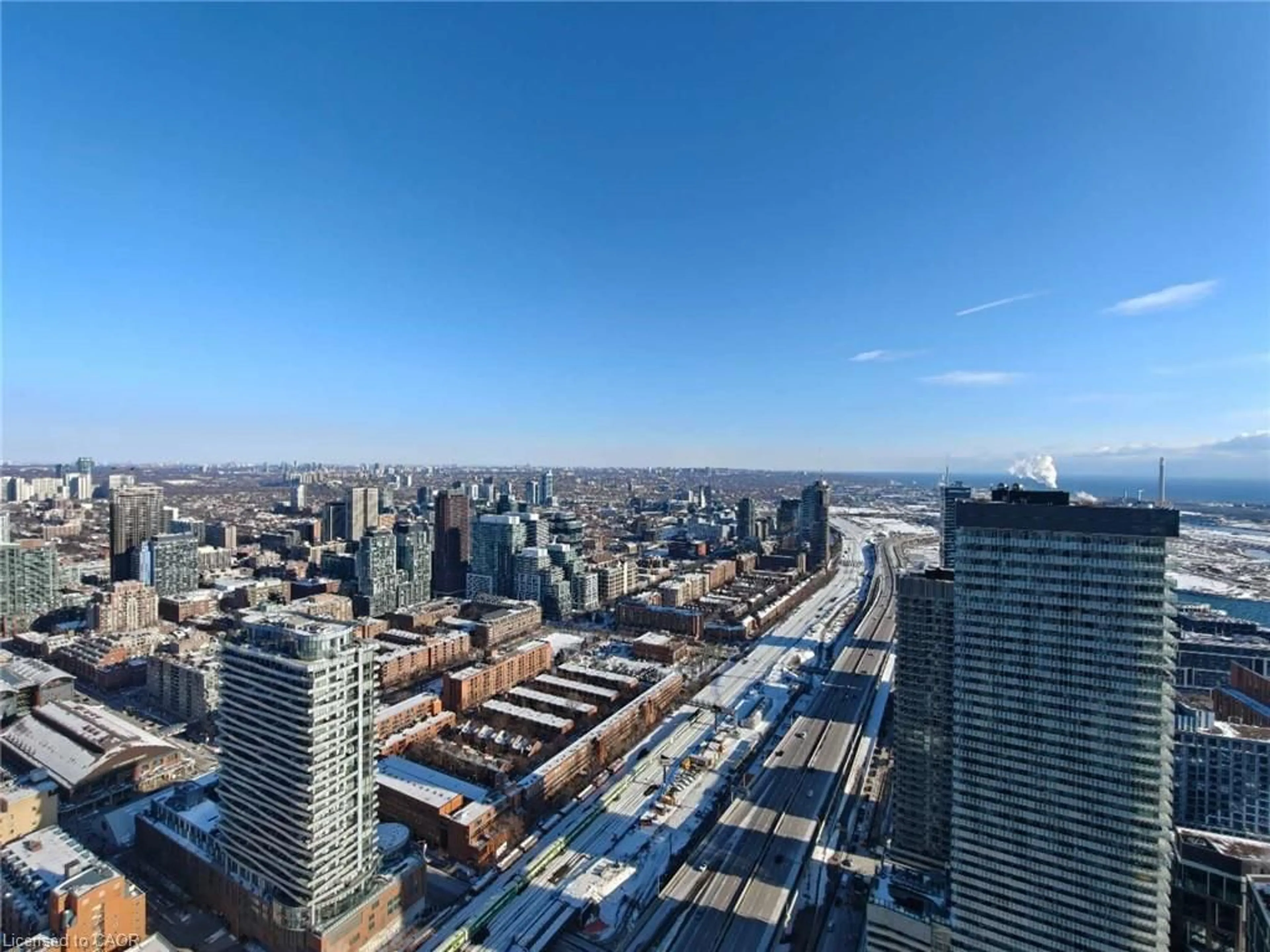 A pic from outside/outdoor area/front of a property/back of a property/a pic from drone, city buildings view from balcony for 55 Cooper St #6008, Toronto Ontario M5E 0G1
