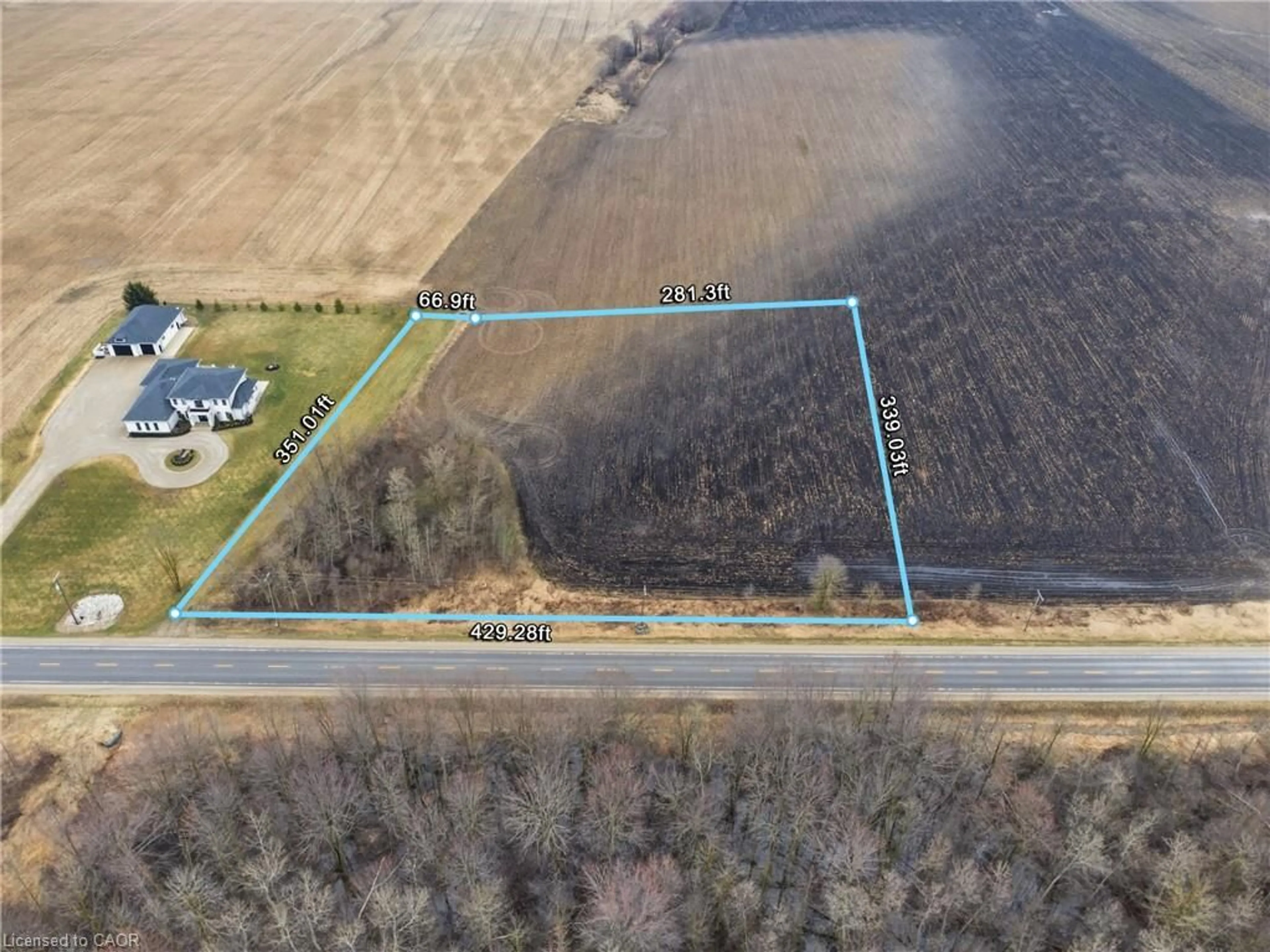 A pic from outside/outdoor area/front of a property/back of a property/a pic from drone, building for 9 Wellington Road 9, Mapleton Ontario N0G 2T0