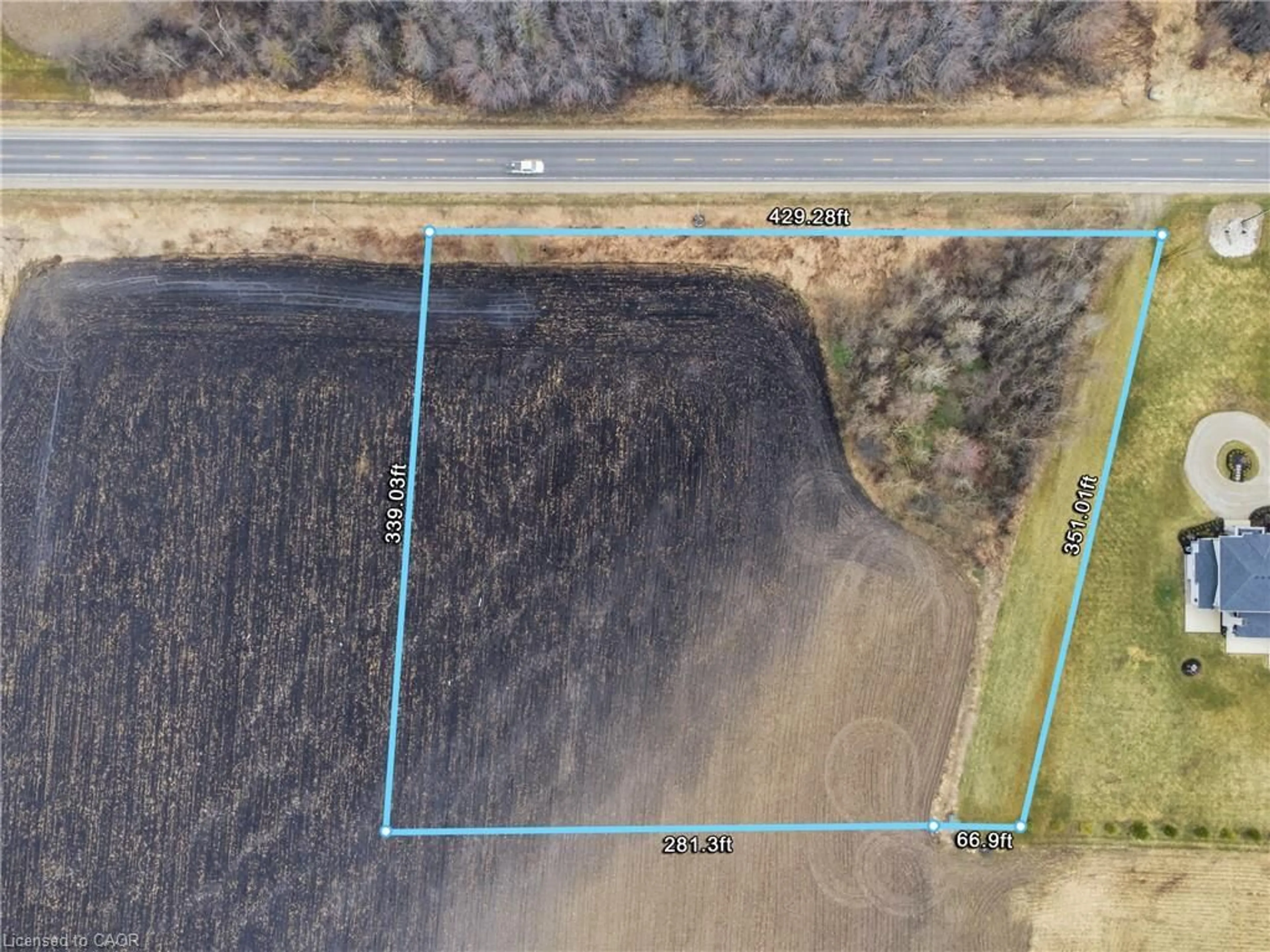 A pic from outside/outdoor area/front of a property/back of a property/a pic from drone, unknown for 9 Wellington Road 9, Mapleton Ontario N0G 2T0